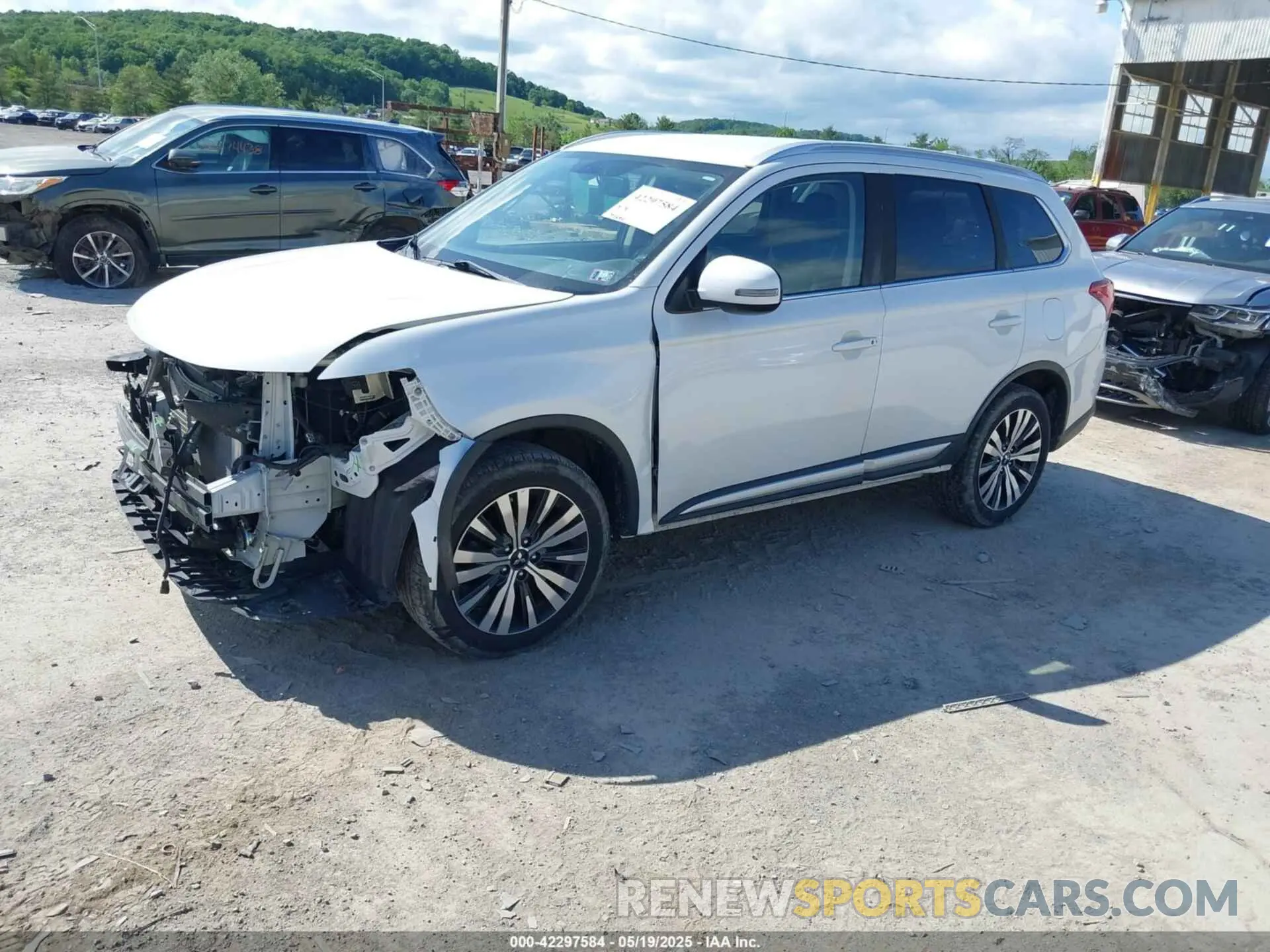 2 fotografías del automóvil dañado JA4AZ3A3XKZ036453 MITSUBISHI OUTLANDER 2019