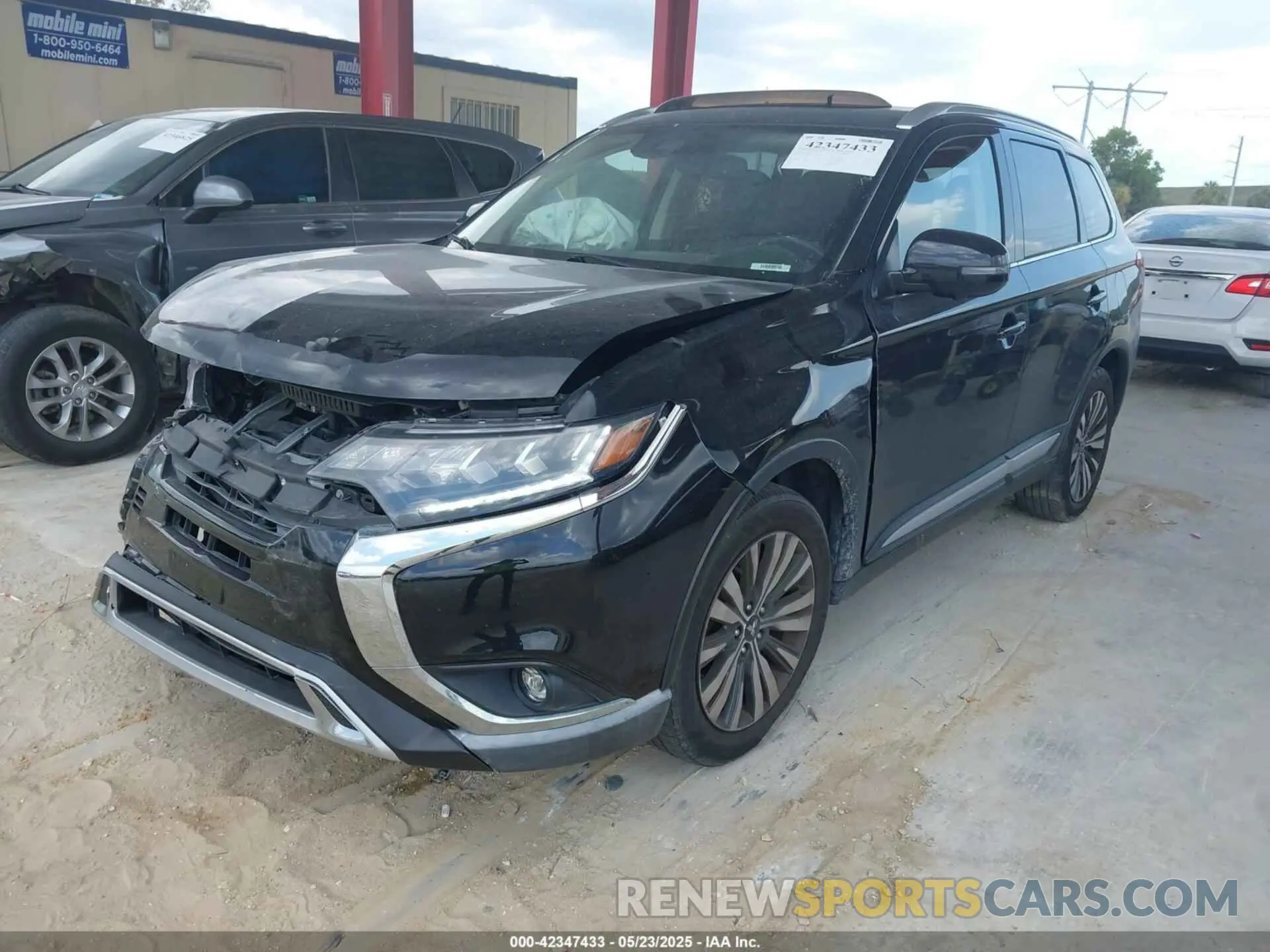 2 fotografías del automóvil dañado JA4AD3A30LZ003073 MITSUBISHI OUTLANDER 2020