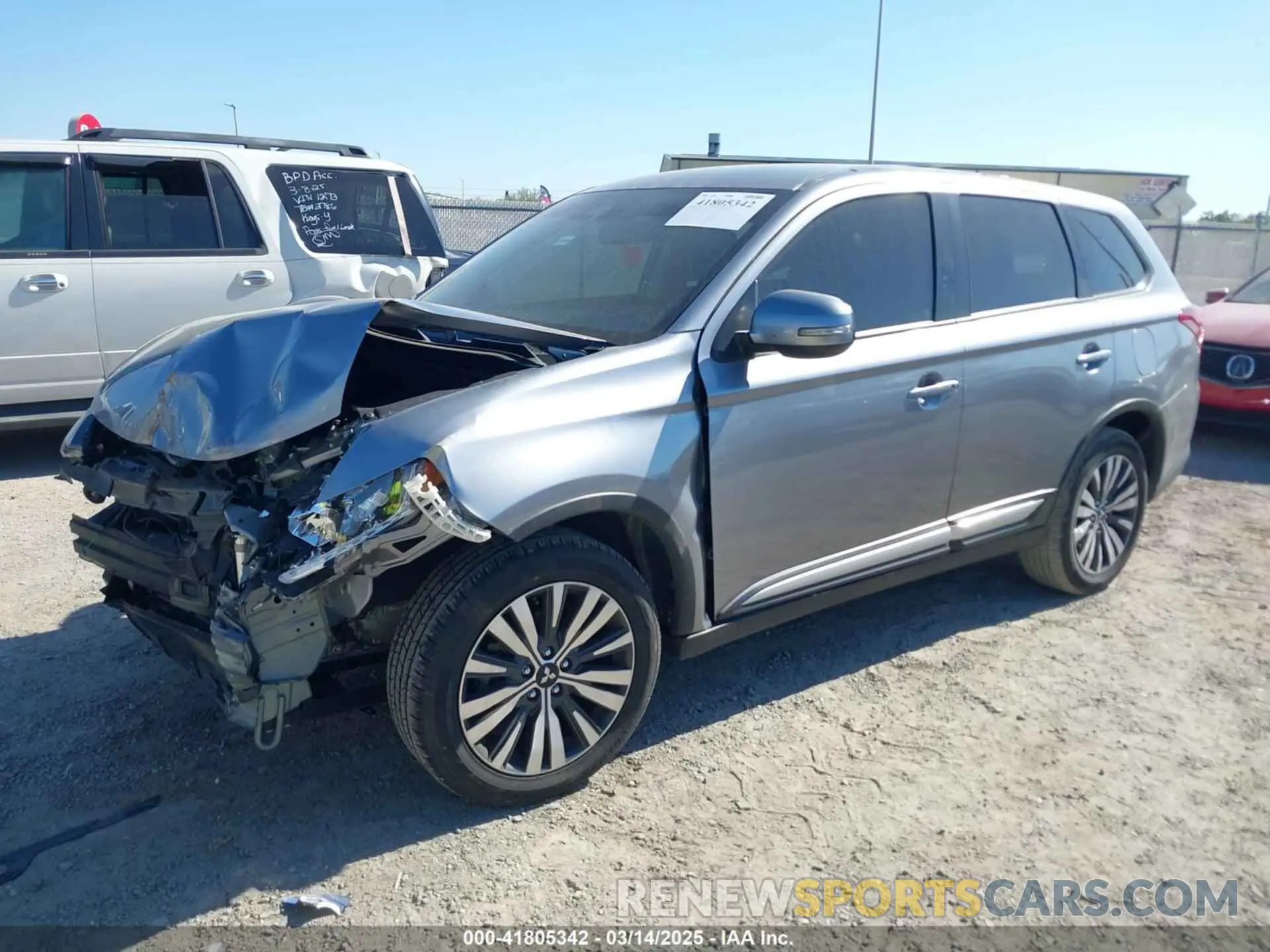 2 fotografías del automóvil dañado JA4AD3A33LZ025410 MITSUBISHI OUTLANDER 2020