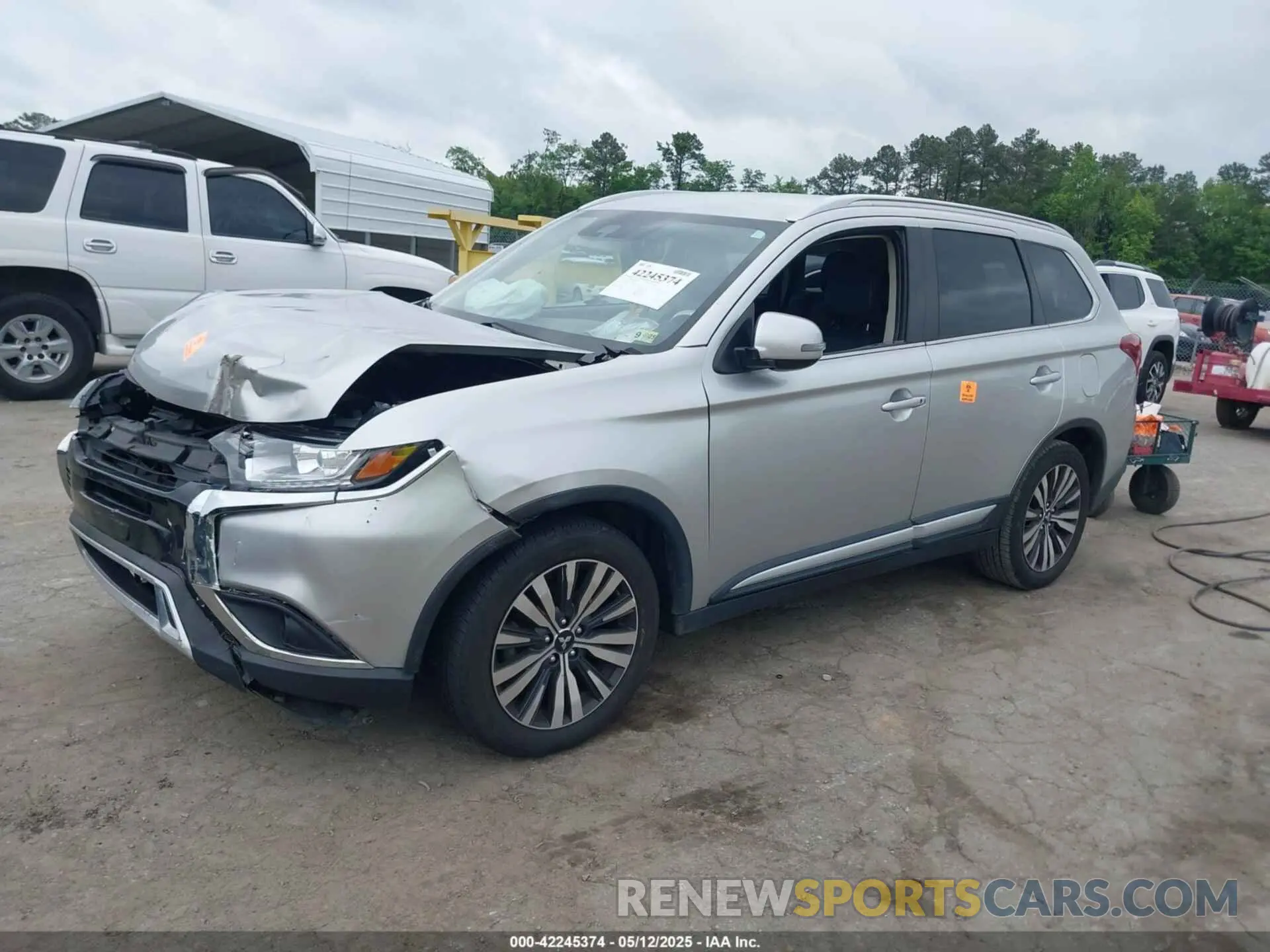 2 fotografías del automóvil dañado JA4AD3A39LZ034015 MITSUBISHI OUTLANDER 2020