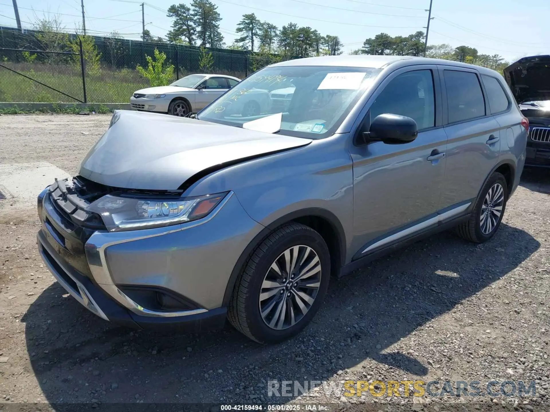 2 fotografías del automóvil dañado JA4AZ3A39LZ048854 MITSUBISHI OUTLANDER 2020