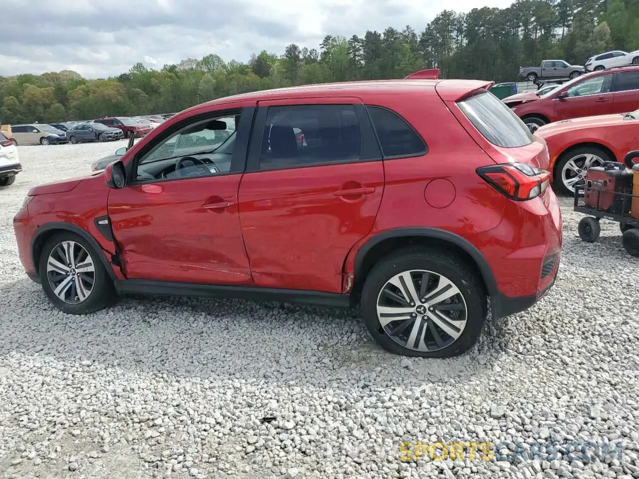 2 fotografías del automóvil dañado JA4APUAUXNU002809 MITSUBISHI OUTLANDER 2022