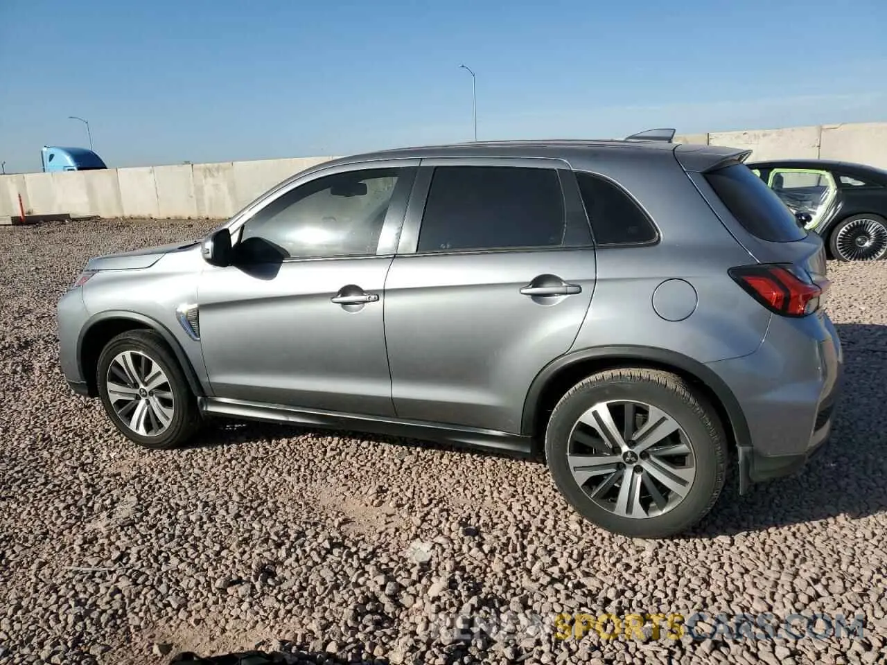 2 fotografías del automóvil dañado JA4APVAUXNU007952 MITSUBISHI OUTLANDER 2022