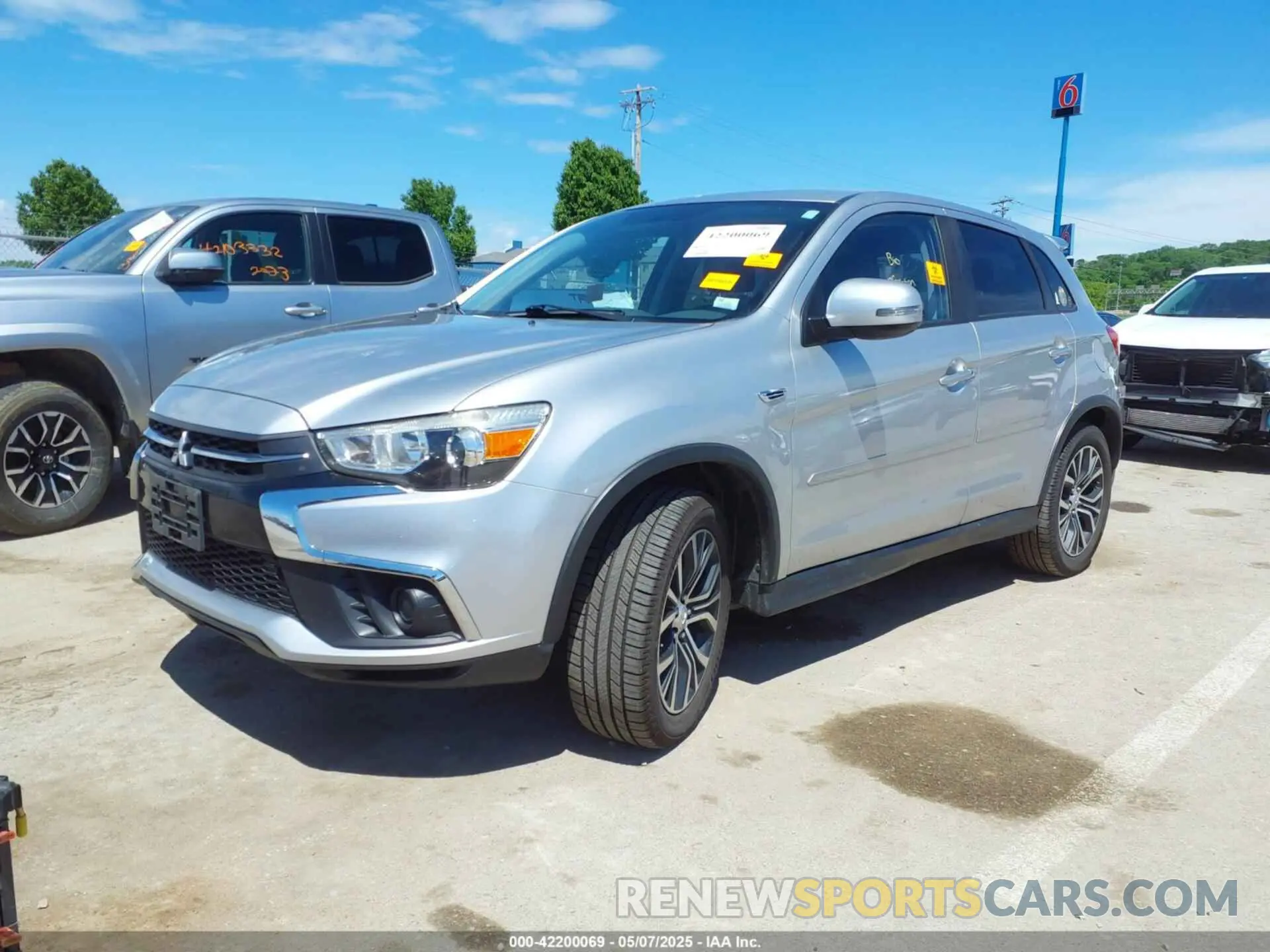 2 fotografías del automóvil dañado JA4AP3AU0KU033072 MITSUBISHI OUTLANDER SPORT 2019