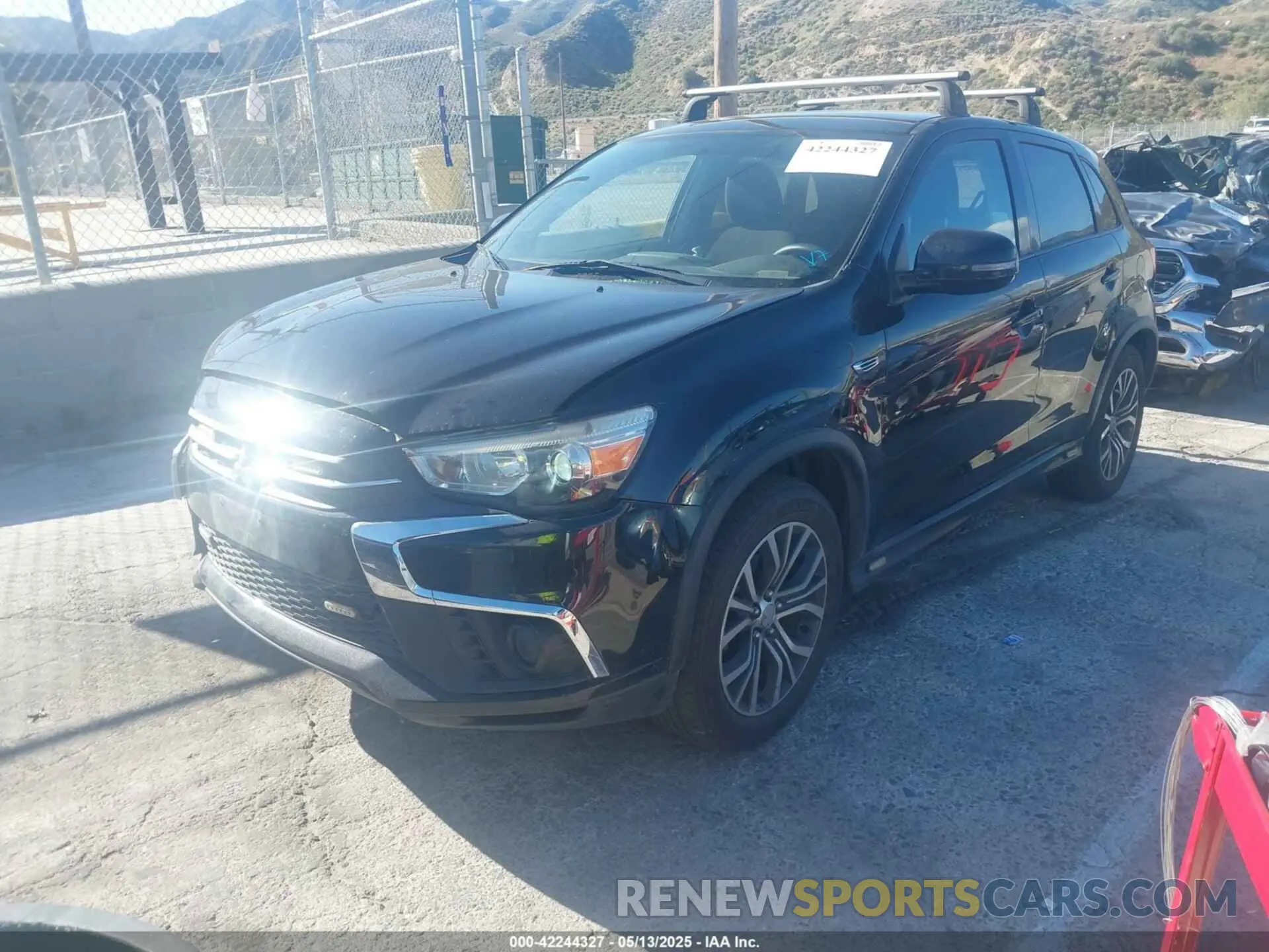 2 fotografías del automóvil dañado JA4AP3AU7KU021503 MITSUBISHI OUTLANDER SPORT 2019