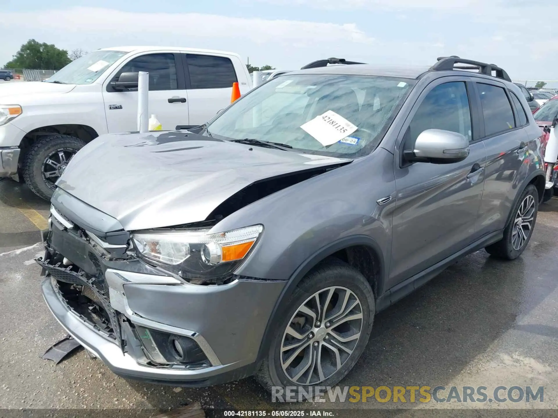 2 fotografías del automóvil dañado JA4AP4AU8KU013142 MITSUBISHI OUTLANDER SPORT 2019
