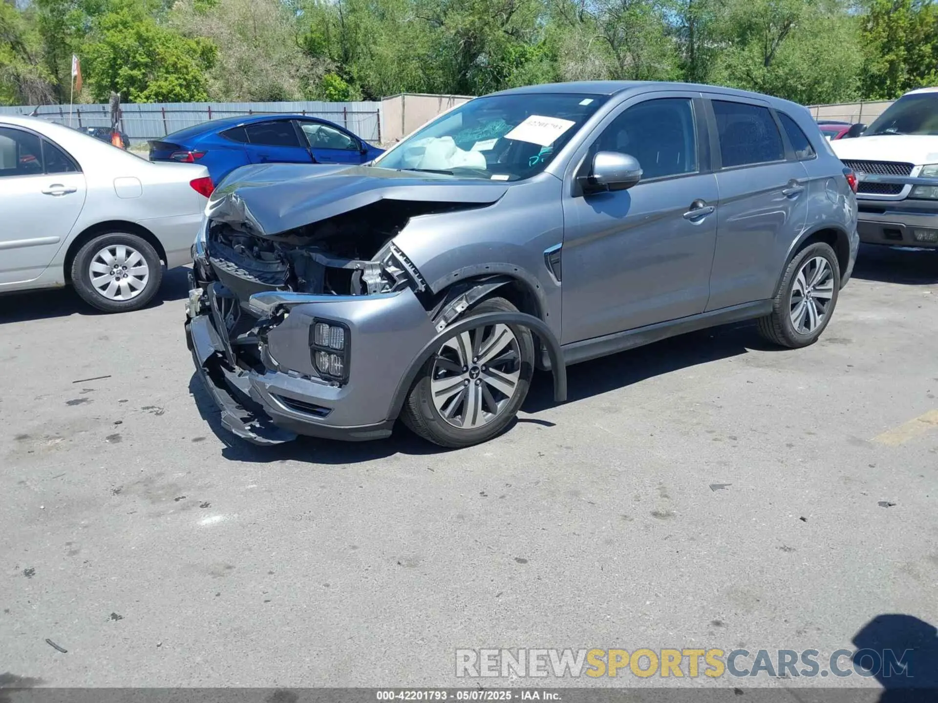 2 fotografías del automóvil dañado JA4ARUAU2MU013554 MITSUBISHI OUTLANDER SPORT 2021