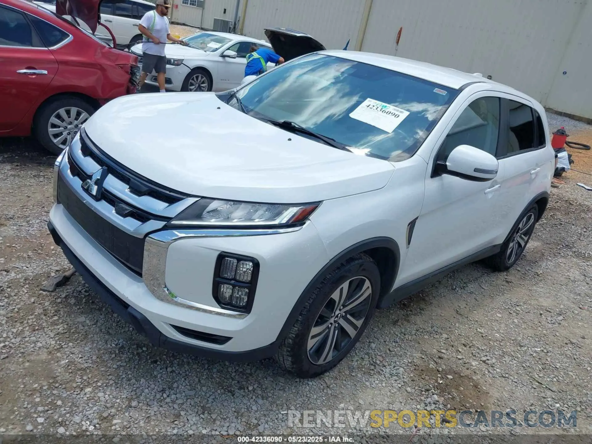 2 fotografías del automóvil dañado JA4ARUAUXMU019523 MITSUBISHI OUTLANDER SPORT 2021
