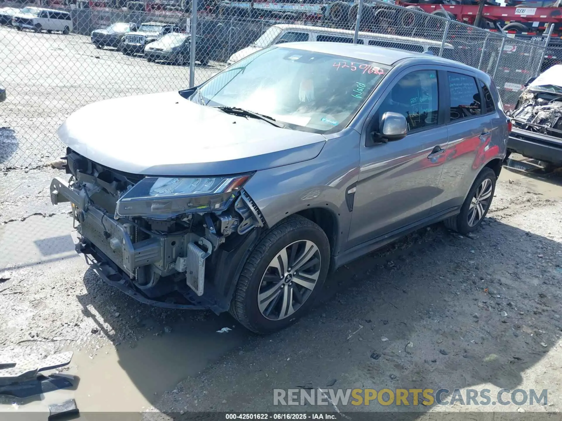 2 fotografías del automóvil dañado JA4APUAU4NU004393 MITSUBISHI OUTLANDER SPORT 2022