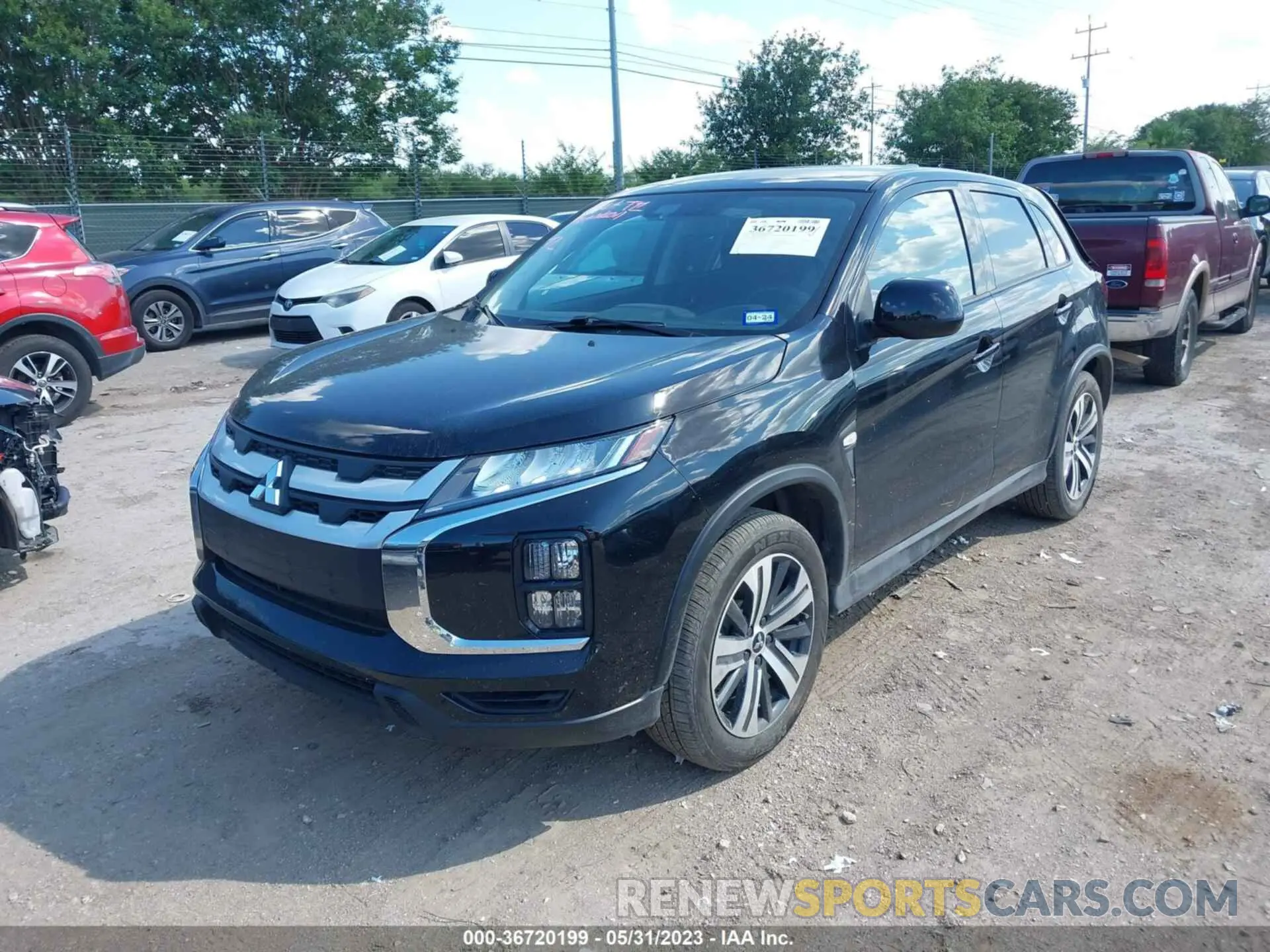 2 fotografías del automóvil dañado JA4APUAU8NU010195 MITSUBISHI OUTLANDER SPORT 2022