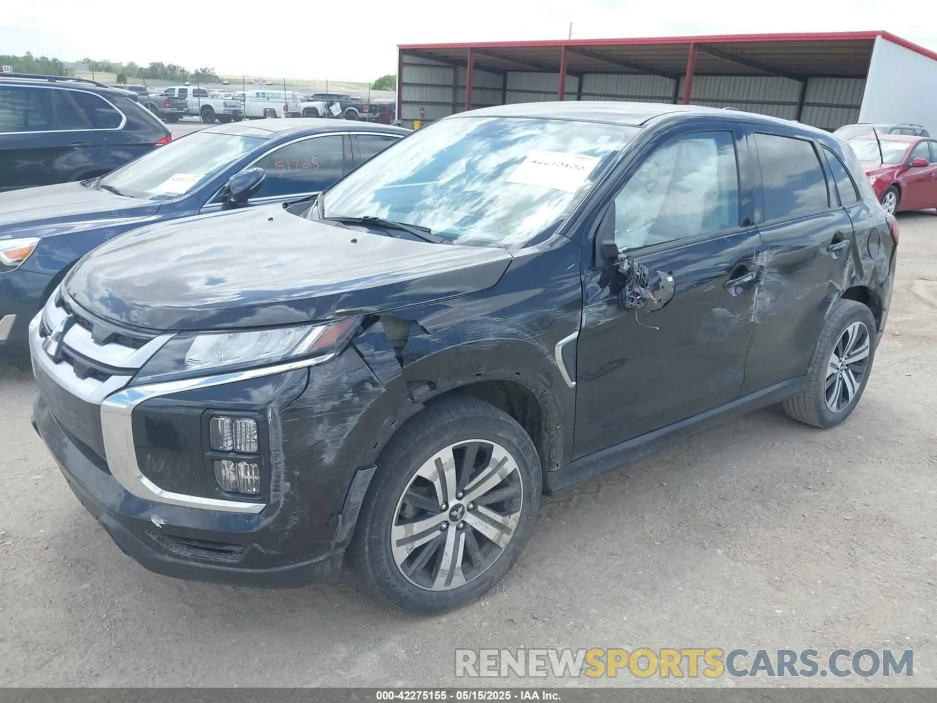 2 fotografías del automóvil dañado JA4APVAU3NU002124 MITSUBISHI OUTLANDER SPORT 2022