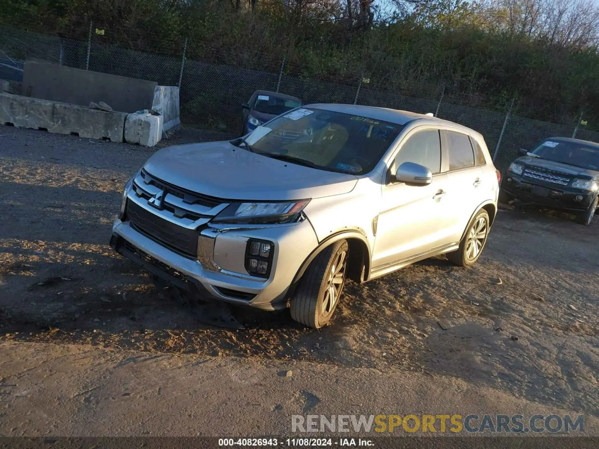 2 fotografías del automóvil dañado JA4APVAUXNU009166 MITSUBISHI OUTLANDER SPORT 2022