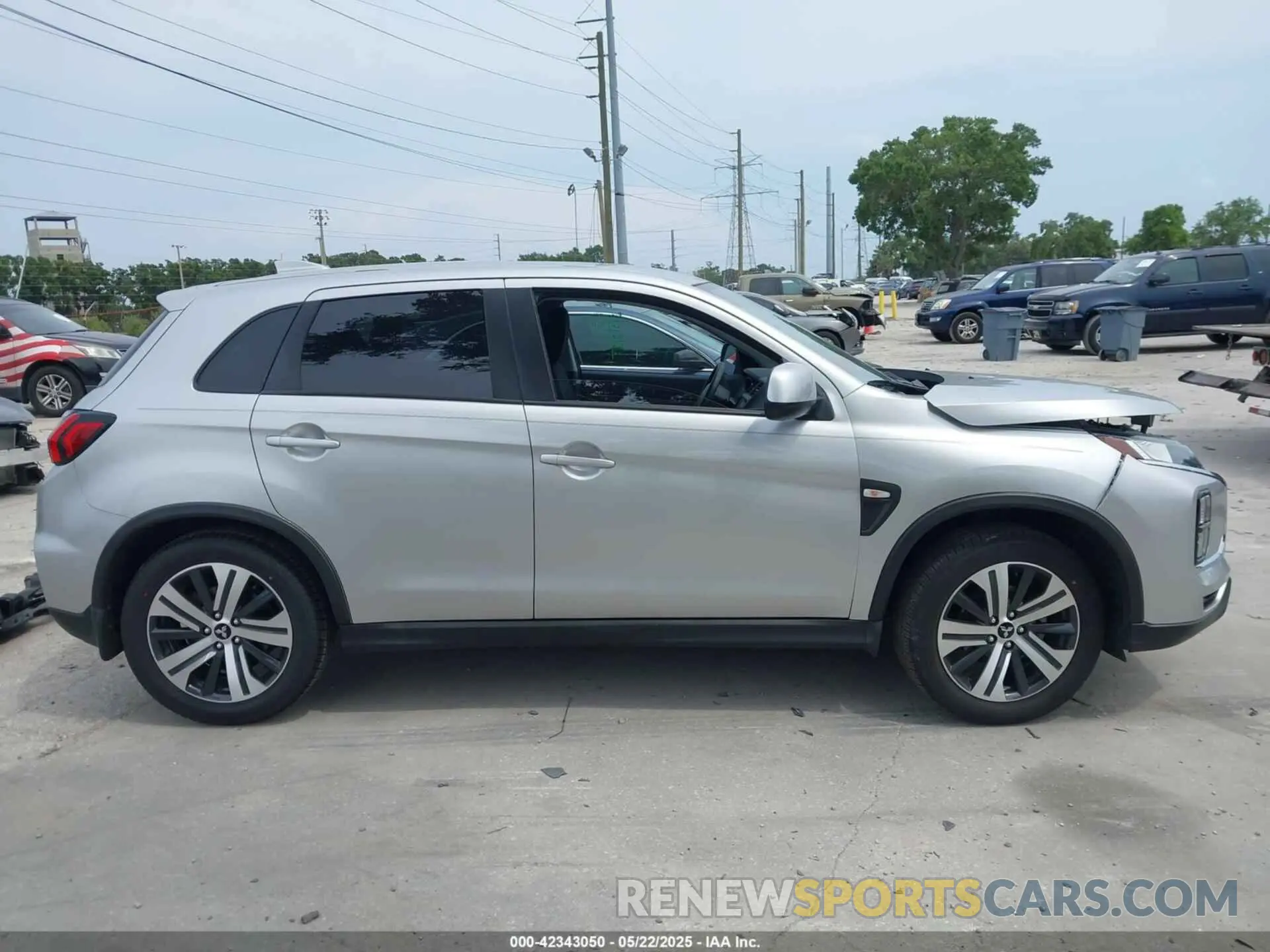 14 fotografías del automóvil dañado JA4ARUAU9PU007786 MITSUBISHI OUTLANDER SPORT 2023
