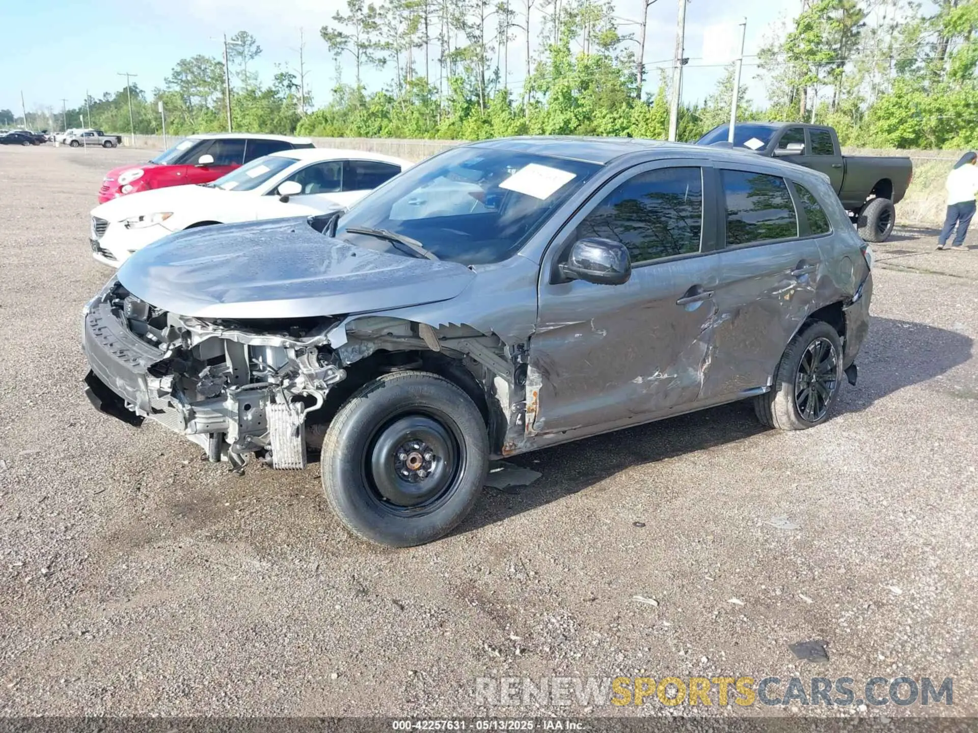 2 fotografías del automóvil dañado JA4ARUAU1RU020180 MITSUBISHI OUTLANDER SPORT 2024