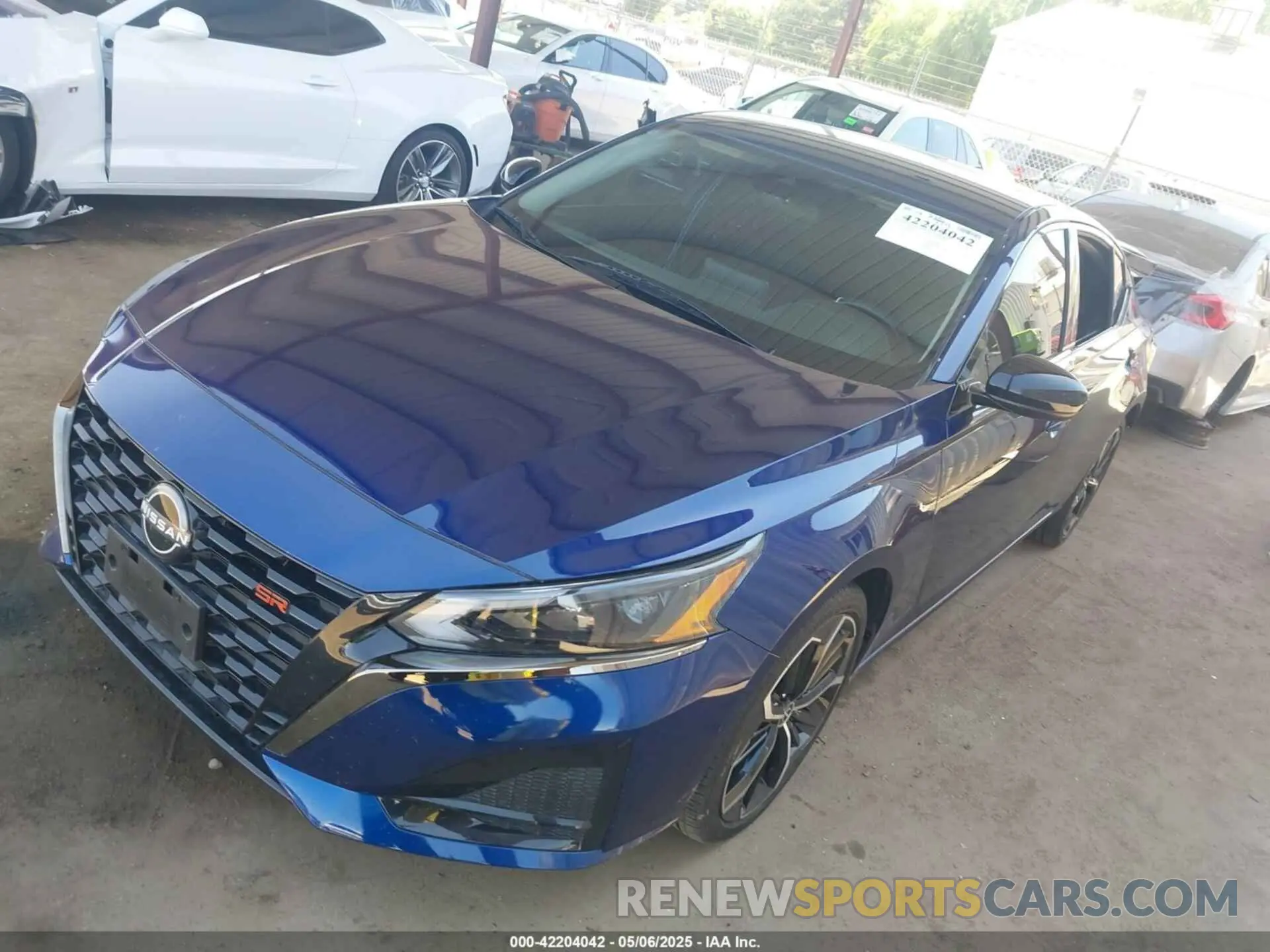 2 fotografías del automóvil dañado 1N4BL4CV1PN416415 NISSAN ALTIMA 2023