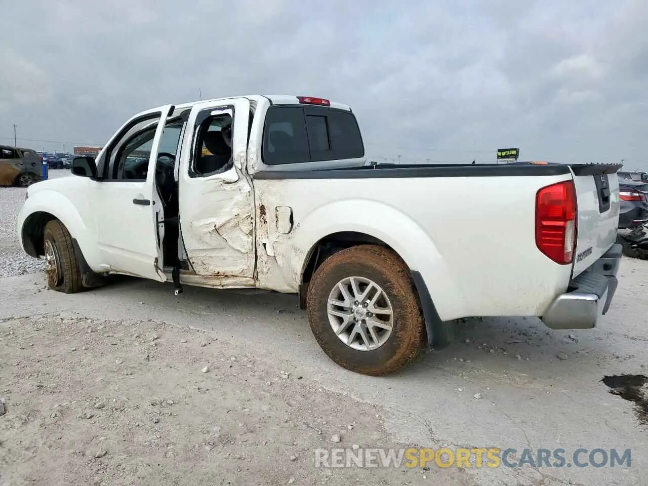 2 fotografías del automóvil dañado 1N6AD0CU0KN879879 NISSAN FRONTIER 2019
