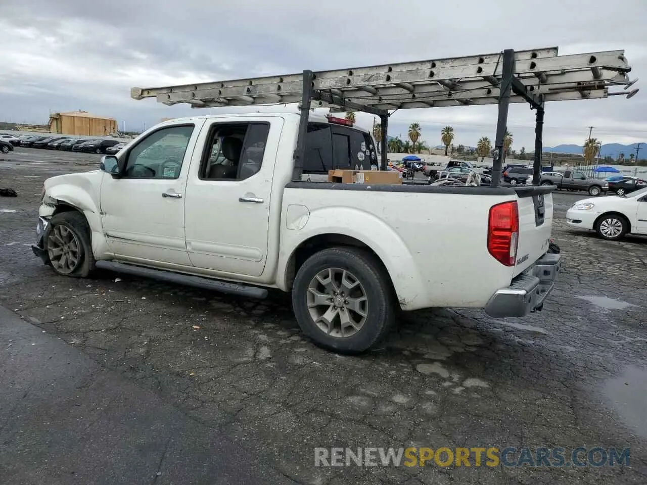 2 fotografías del automóvil dañado 1N6AD0ER0KN762294 NISSAN FRONTIER 2019
