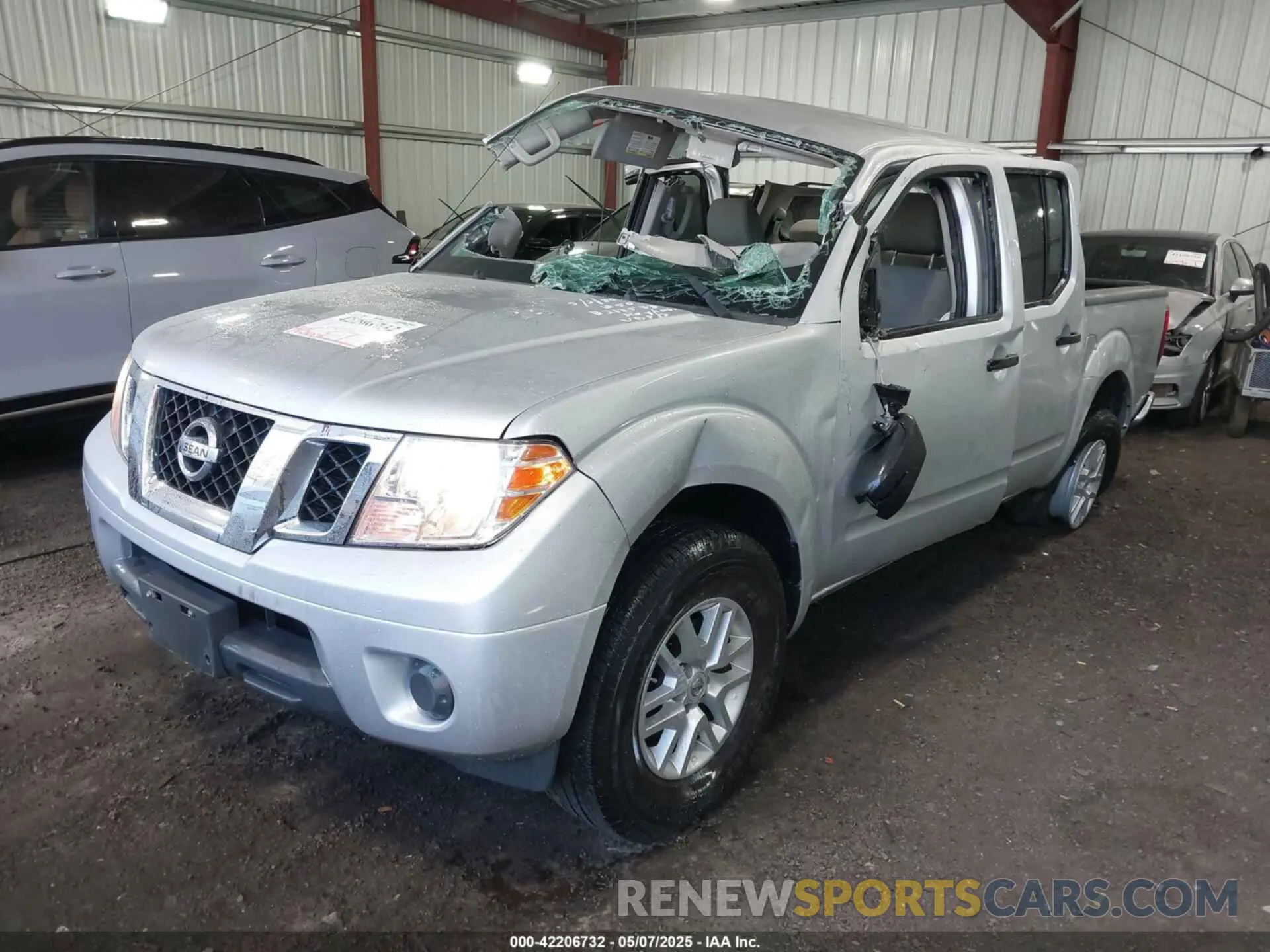2 fotografías del automóvil dañado 1N6AD0ER5KN790768 NISSAN FRONTIER 2019