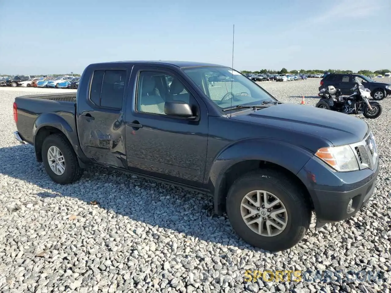 4 fotografías del automóvil dañado 1N6AD0EV4KN786630 NISSAN FRONTIER 2019