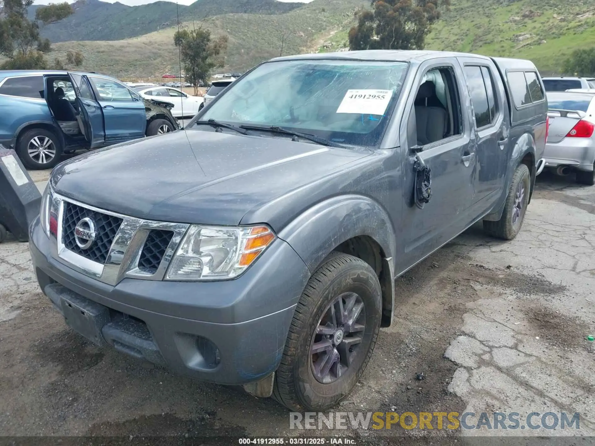 2 fotografías del automóvil dañado 1N6AD0EV7KN704633 NISSAN FRONTIER 2019