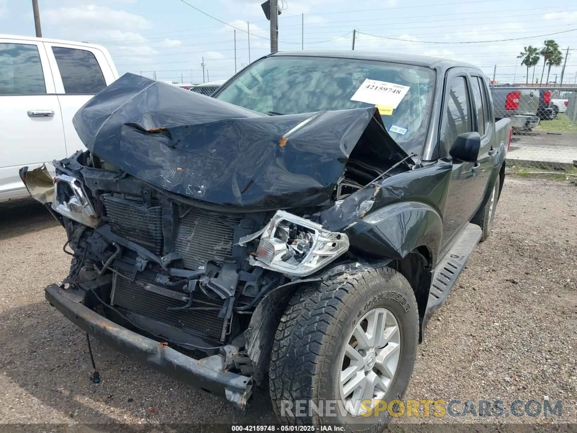 2 fotografías del automóvil dañado 1N6AD0EVXKN701354 NISSAN FRONTIER 2019