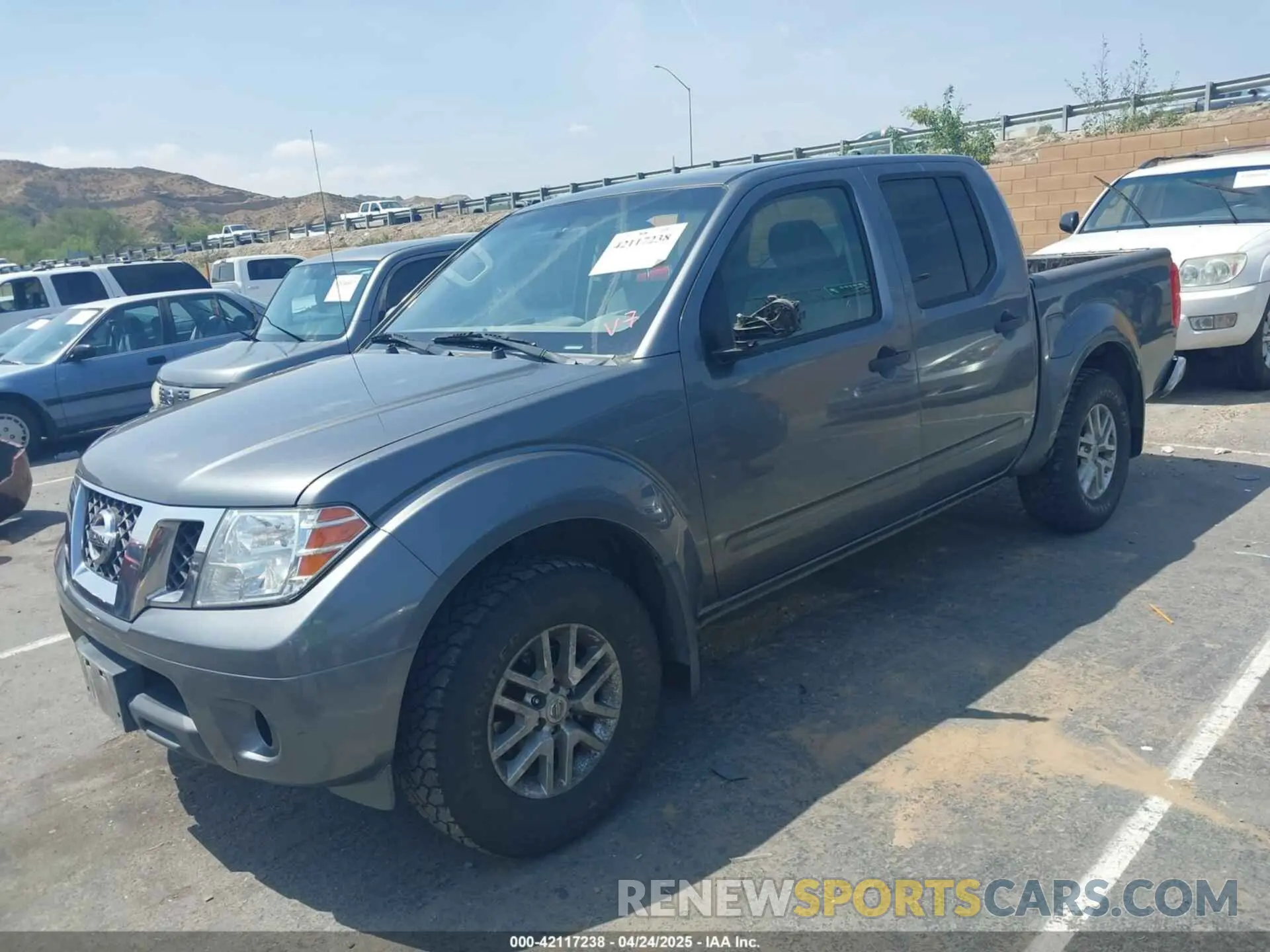 2 fotografías del automóvil dañado 1N6ED0EAXLN709437 NISSAN FRONTIER 2020