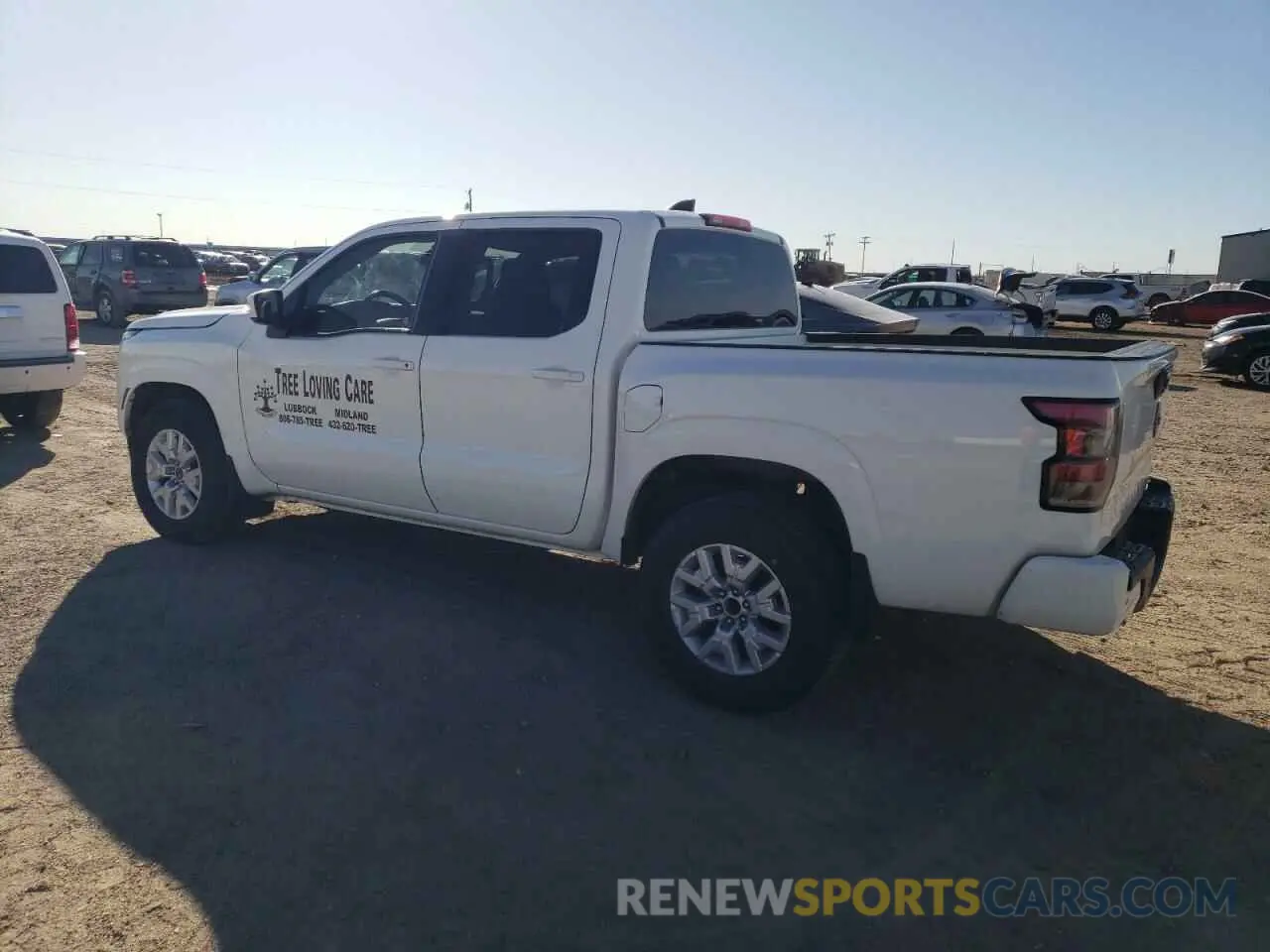 2 fotografías del automóvil dañado 1N6ED1EJ1PN614972 NISSAN FRONTIER 2023