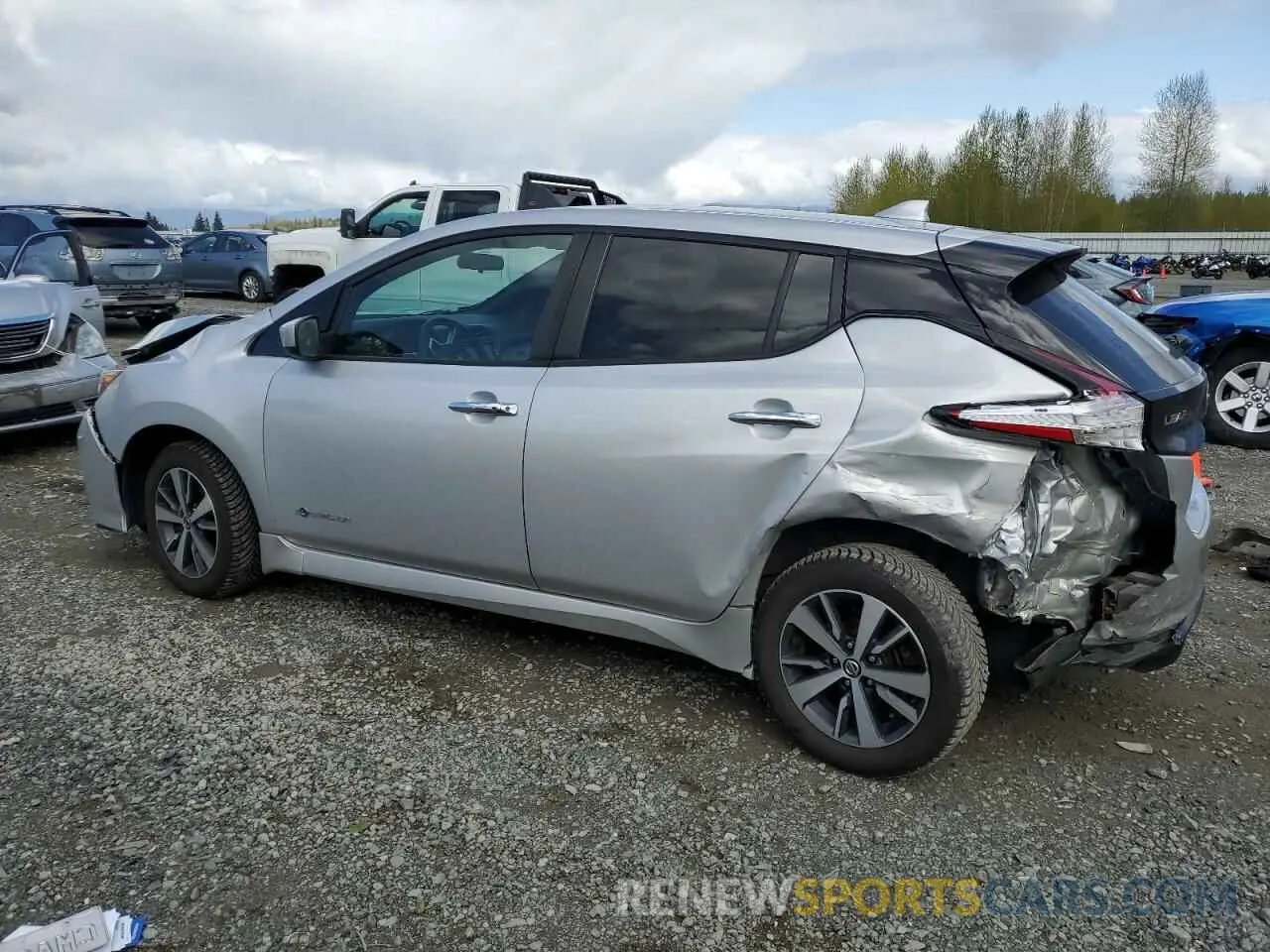 2 fotografías del automóvil dañado 1N4BZ1CP2KC318447 NISSAN LEAF 2019