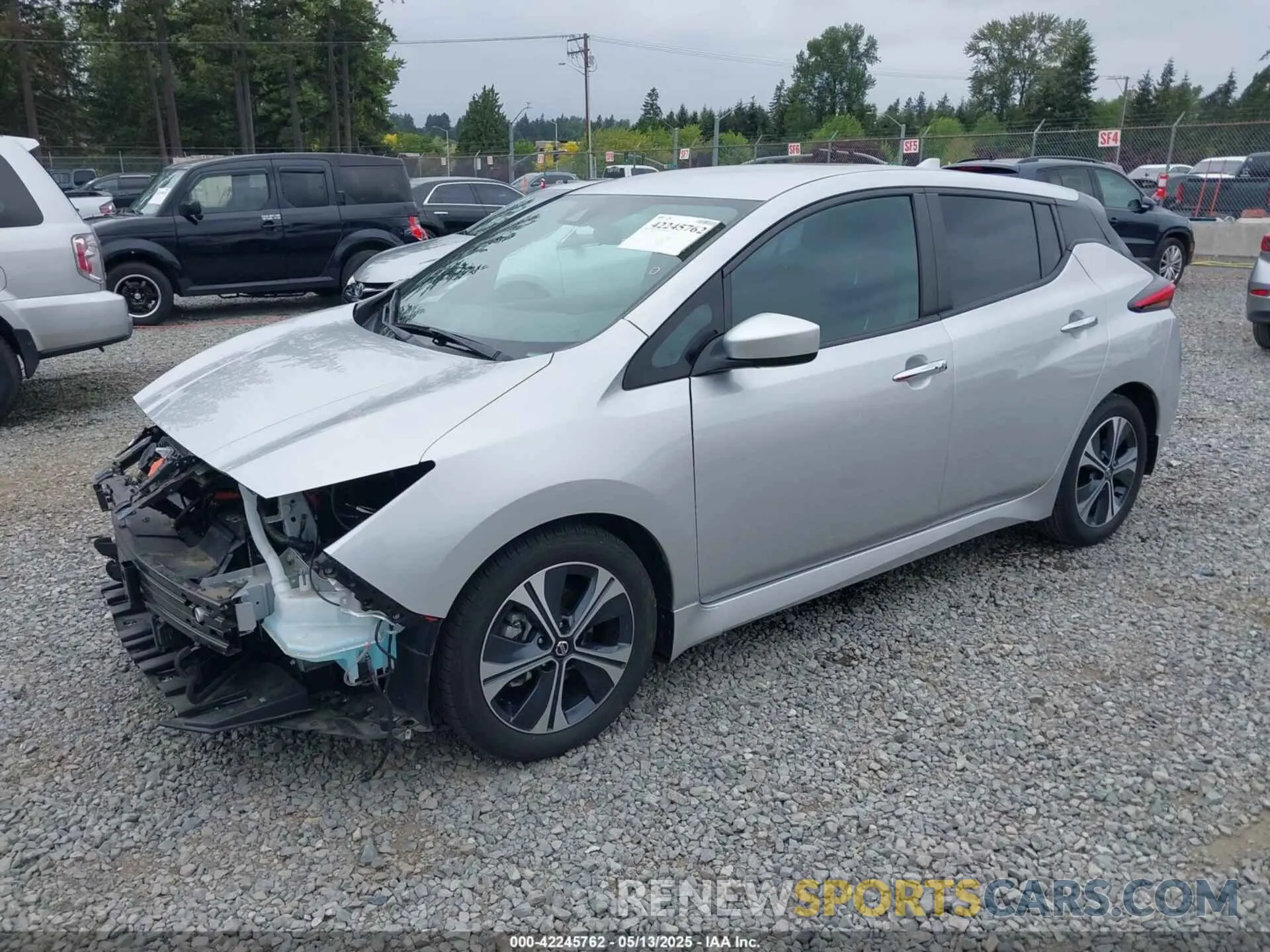 2 fotografías del automóvil dañado 1N4AZ1CV5NC551964 NISSAN LEAF 2022