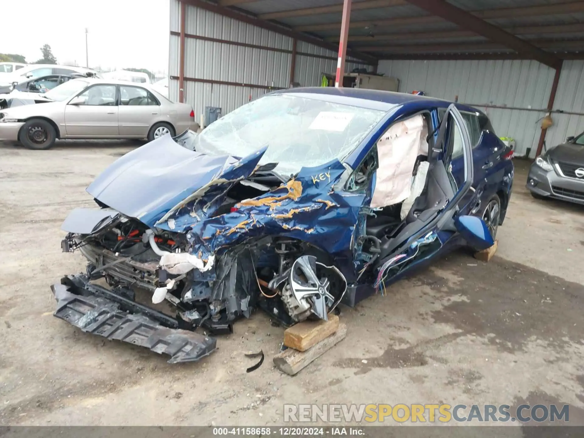 2 fotografías del automóvil dañado 1N4AZ1CV6NC552475 NISSAN LEAF 2022