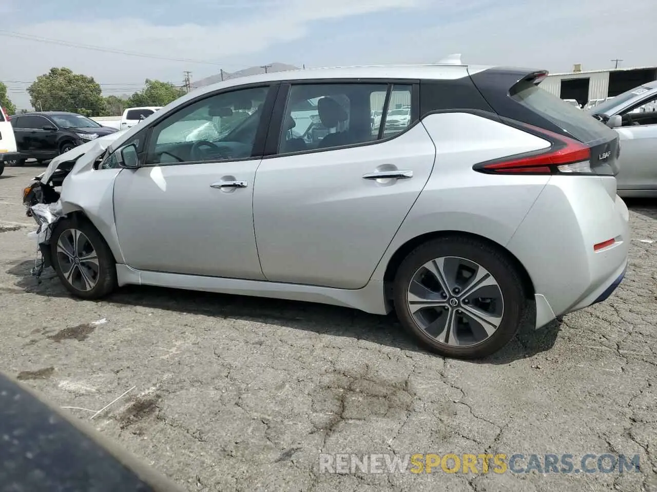 2 fotografías del automóvil dañado 1N4AZ1CVXNC559199 NISSAN LEAF 2022
