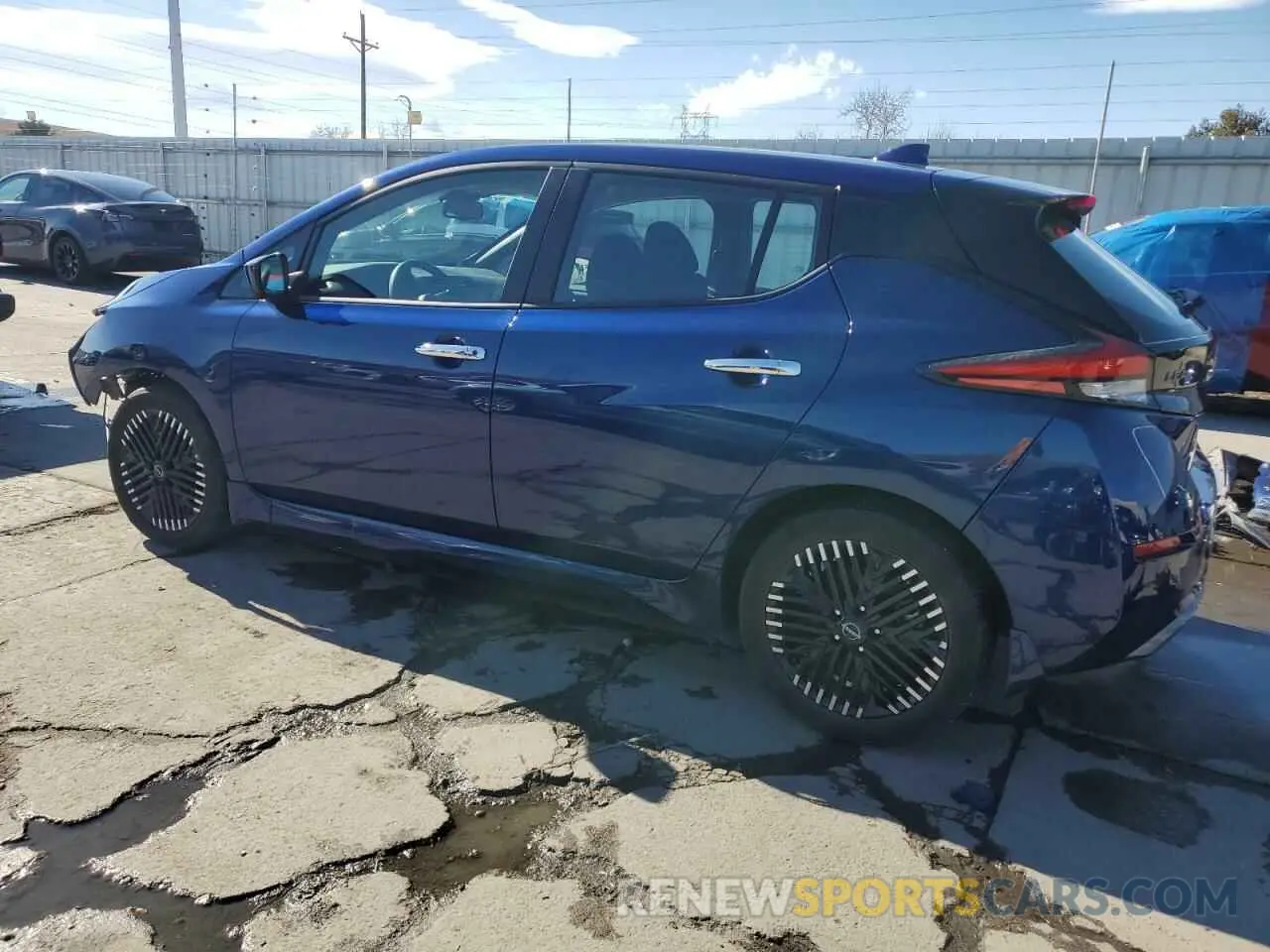 2 fotografías del automóvil dañado 1N4CZ1CV7PC561374 NISSAN LEAF 2023