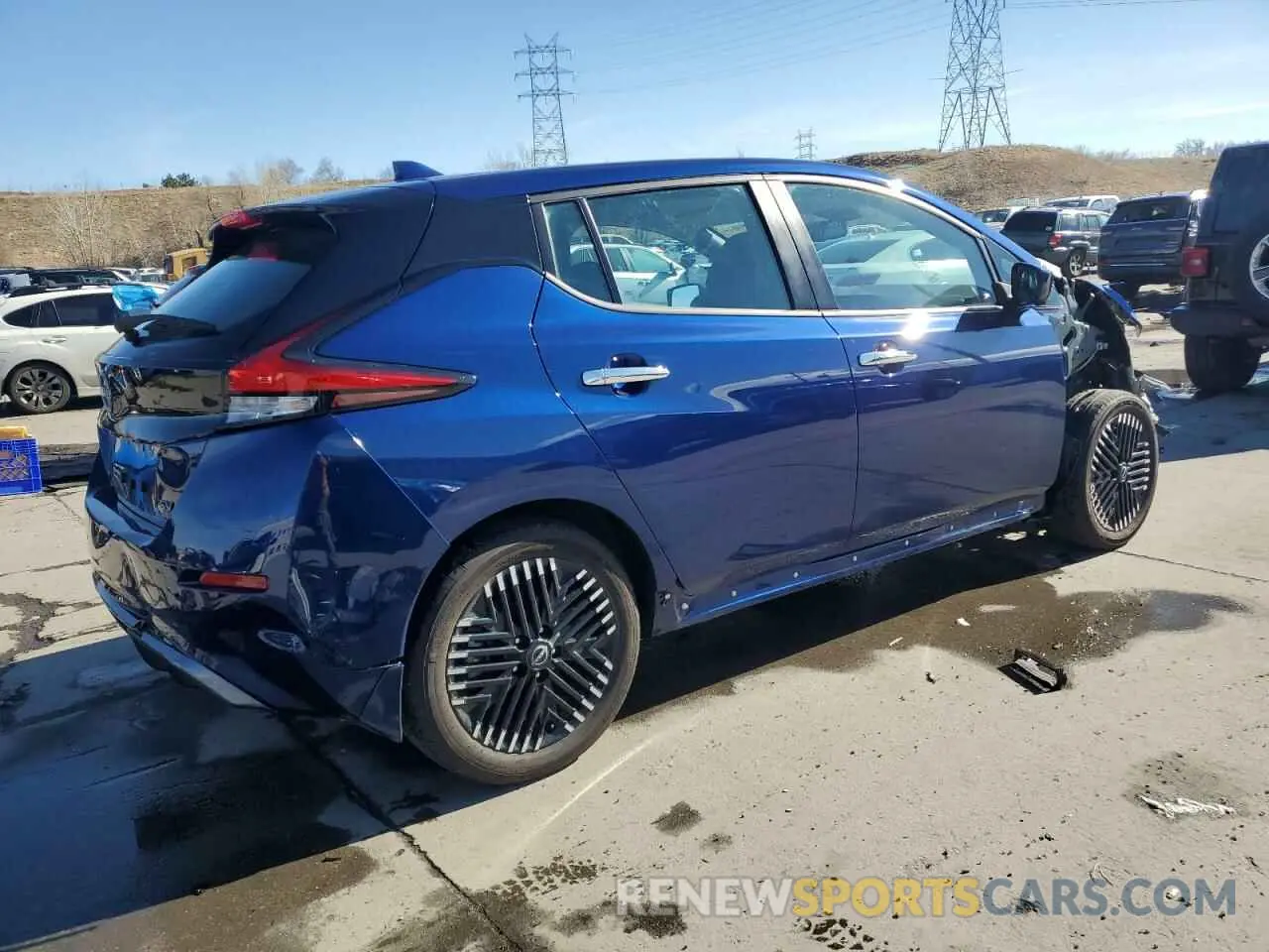 3 fotografías del automóvil dañado 1N4CZ1CV7PC561374 NISSAN LEAF 2023