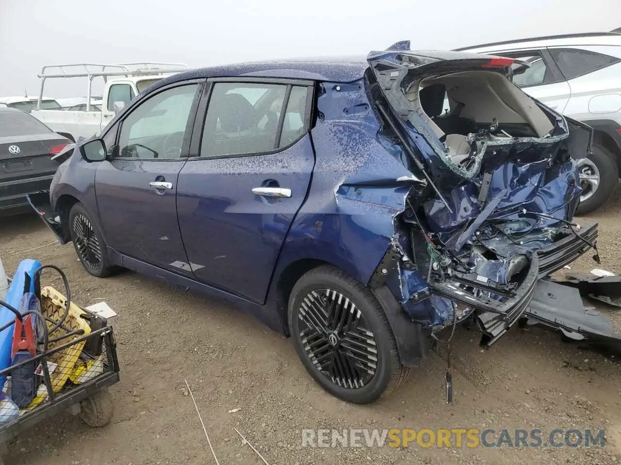 2 fotografías del automóvil dañado 1N4CZ1CV8SC561070 NISSAN LEAF 2025