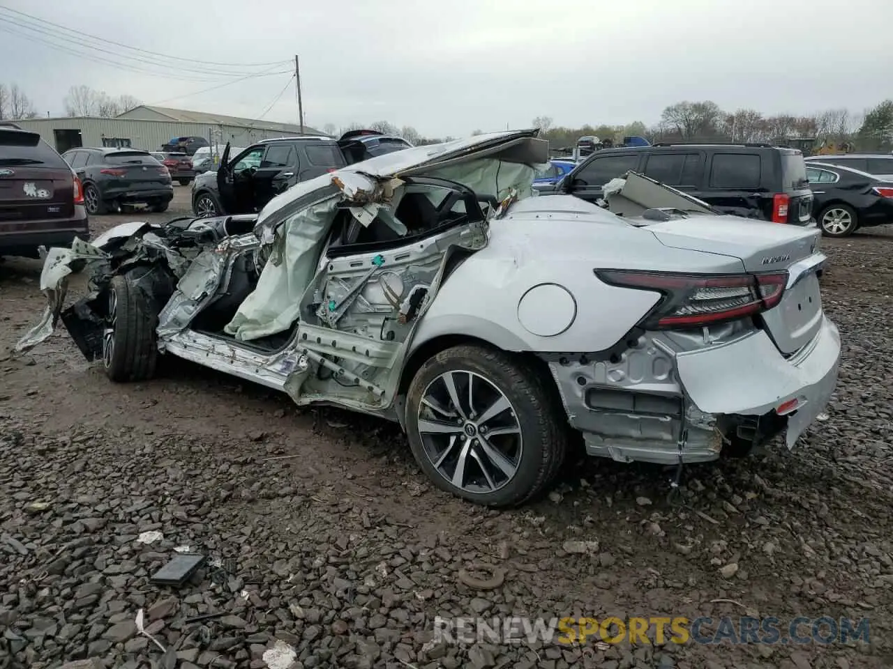 2 fotografías del automóvil dañado 1N4AA6CV5PC511312 NISSAN MAXIMA 2023