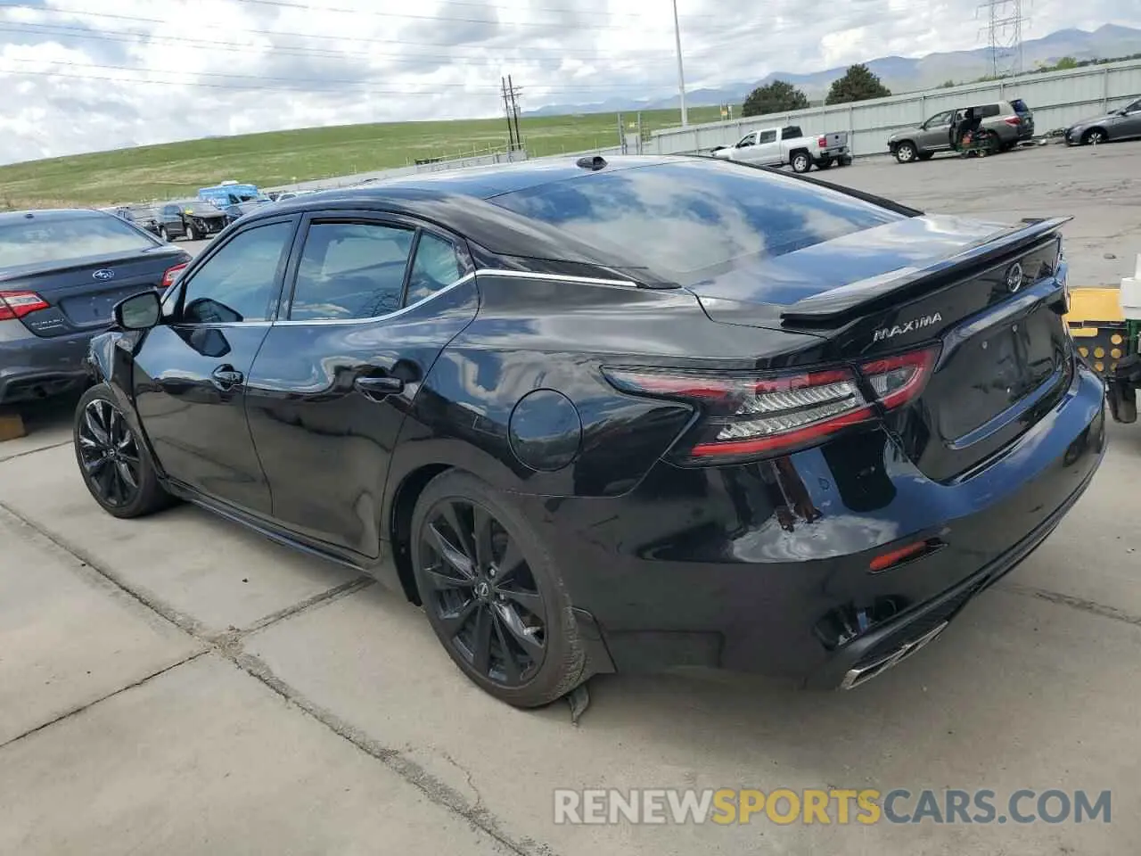 2 fotografías del automóvil dañado 1N4AA6EV7PC502303 NISSAN MAXIMA 2023