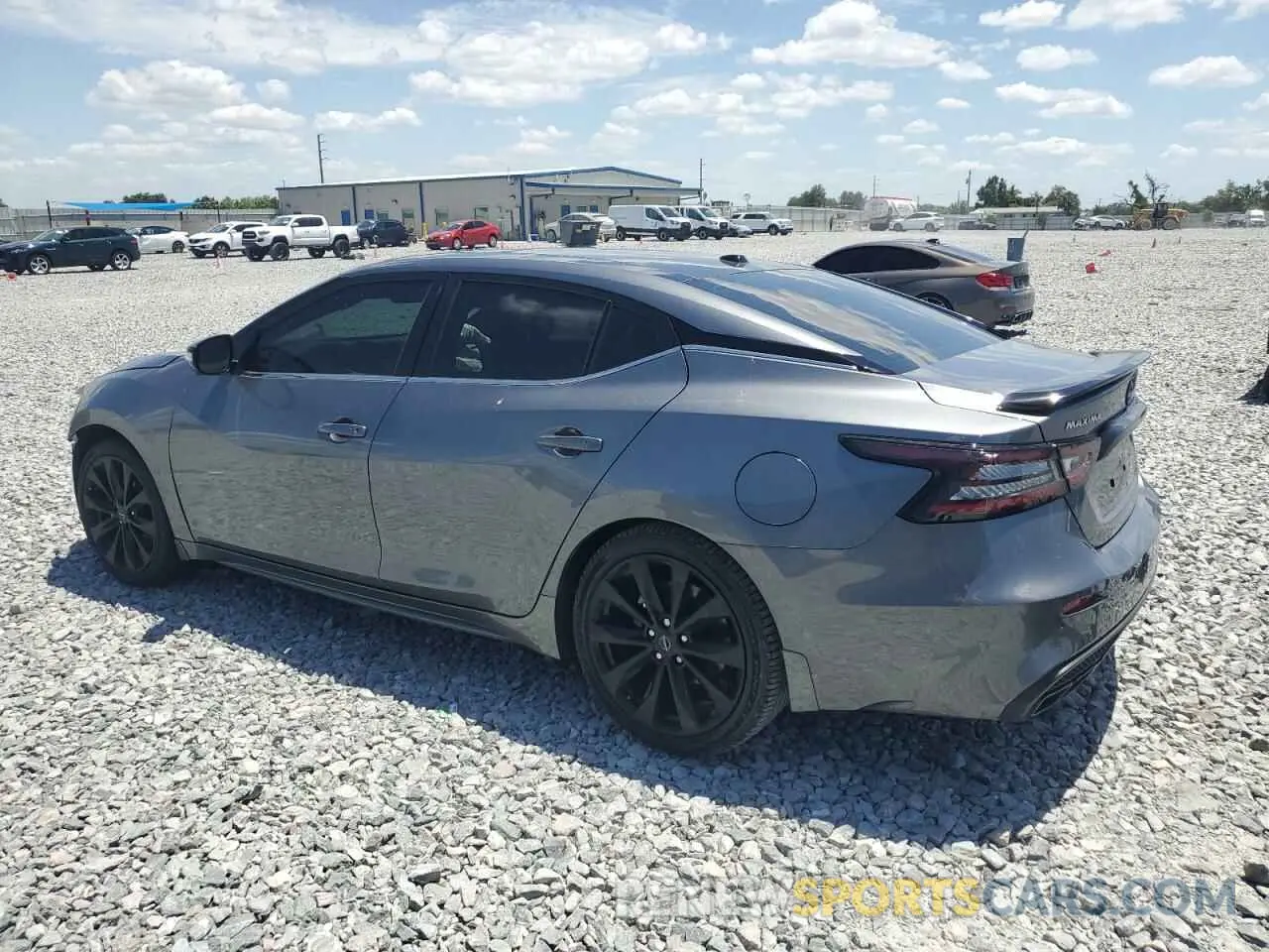 2 fotografías del automóvil dañado 1N4AA6EVXPC513845 NISSAN MAXIMA 2023