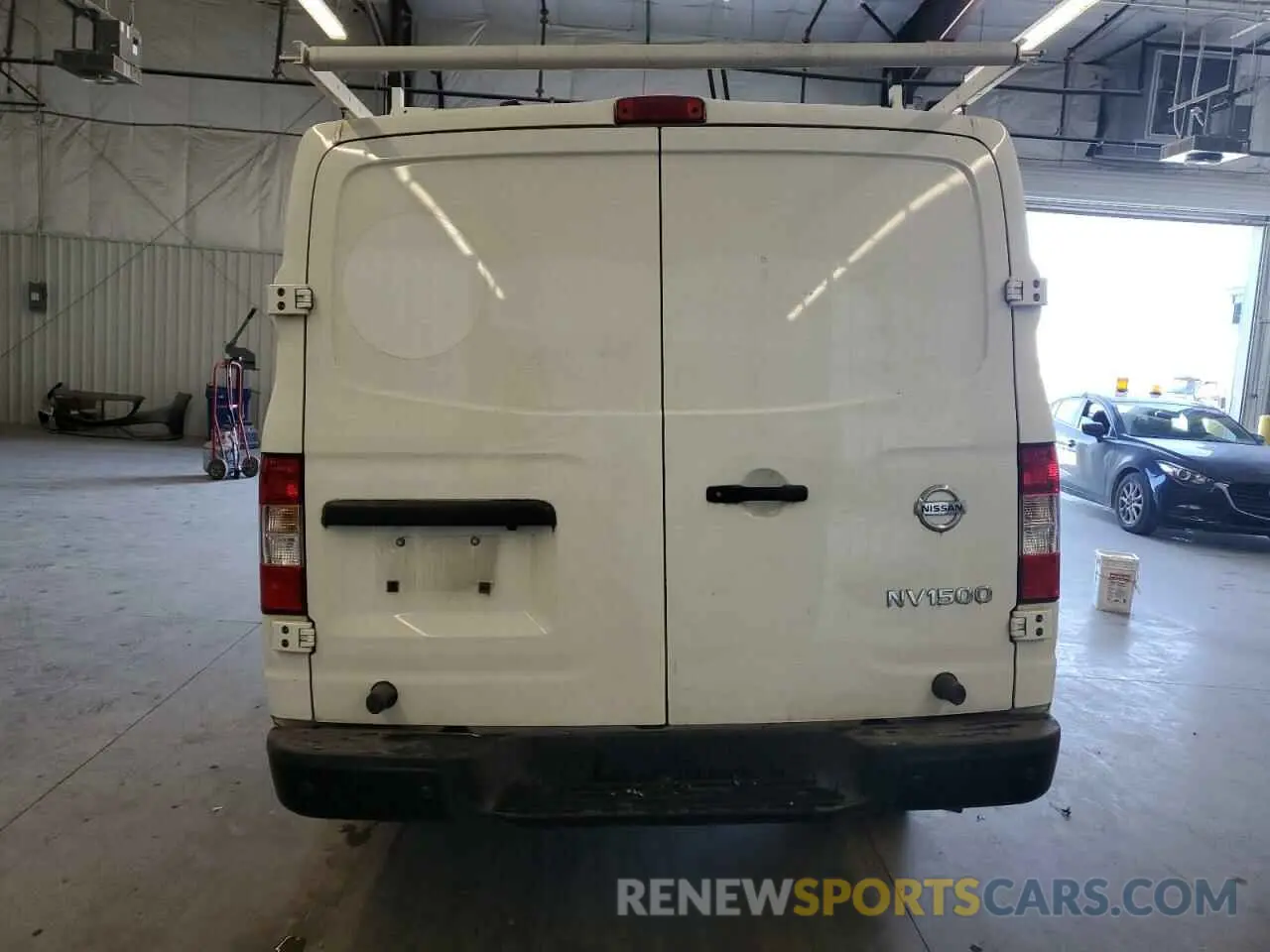 6 fotografías del automóvil dañado 1N6BF0KM2MN806323 NISSAN NV 2021