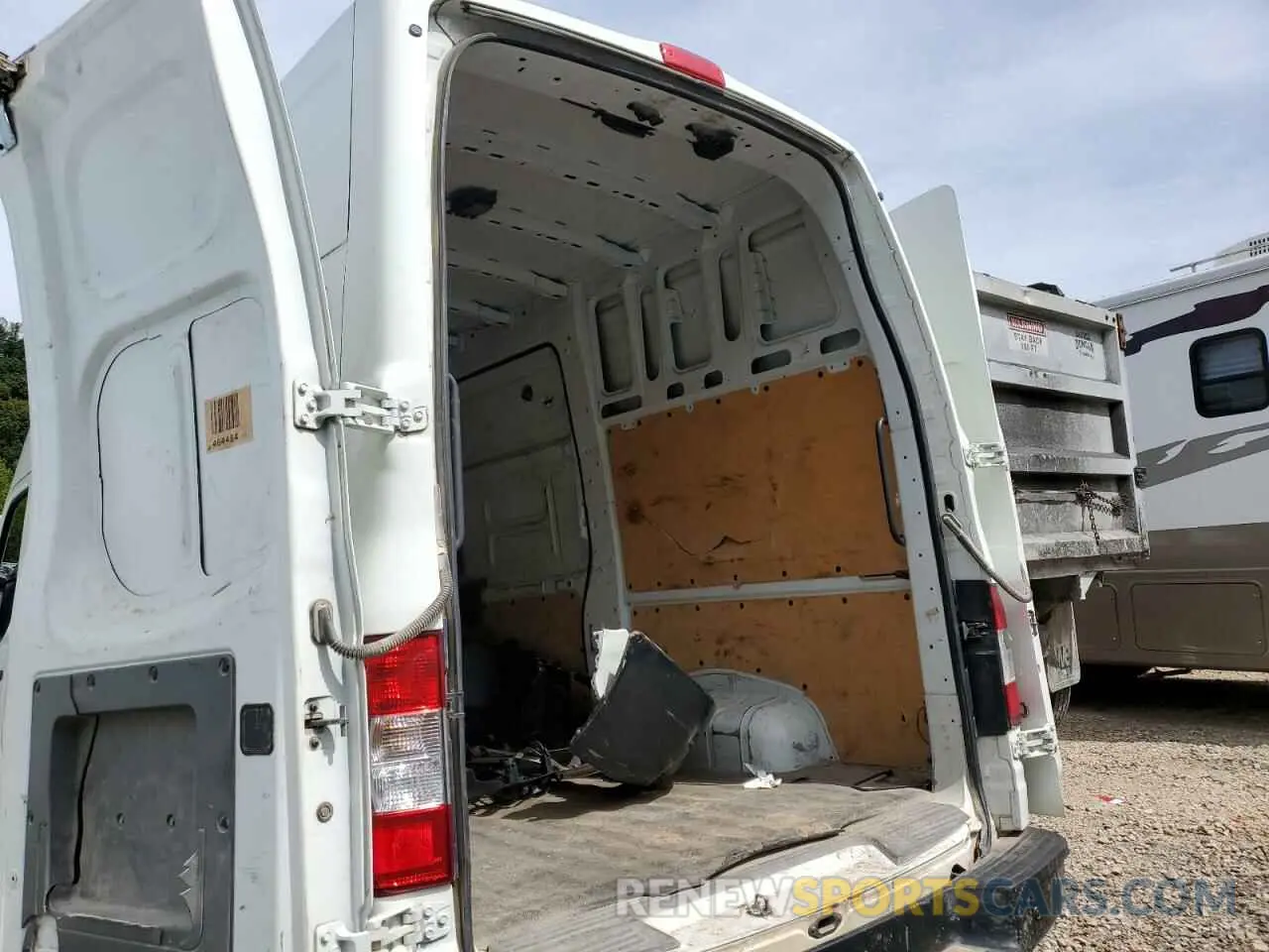 11 fotografías del automóvil dañado 1N6BF0LY4MN806857 NISSAN NV 2021