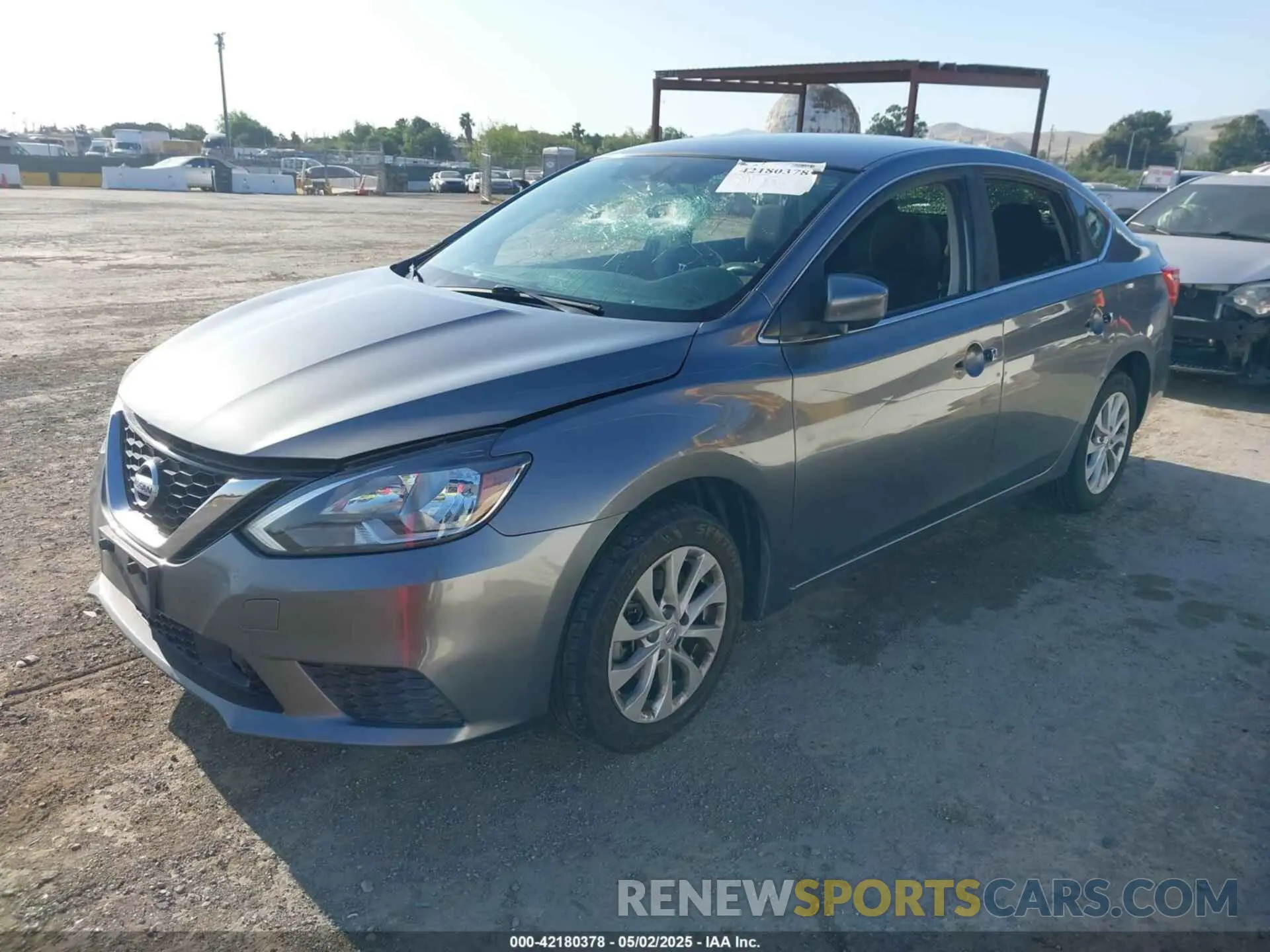 2 fotografías del automóvil dañado 3N1AB7AP0KY283319 NISSAN SENTRA 2019