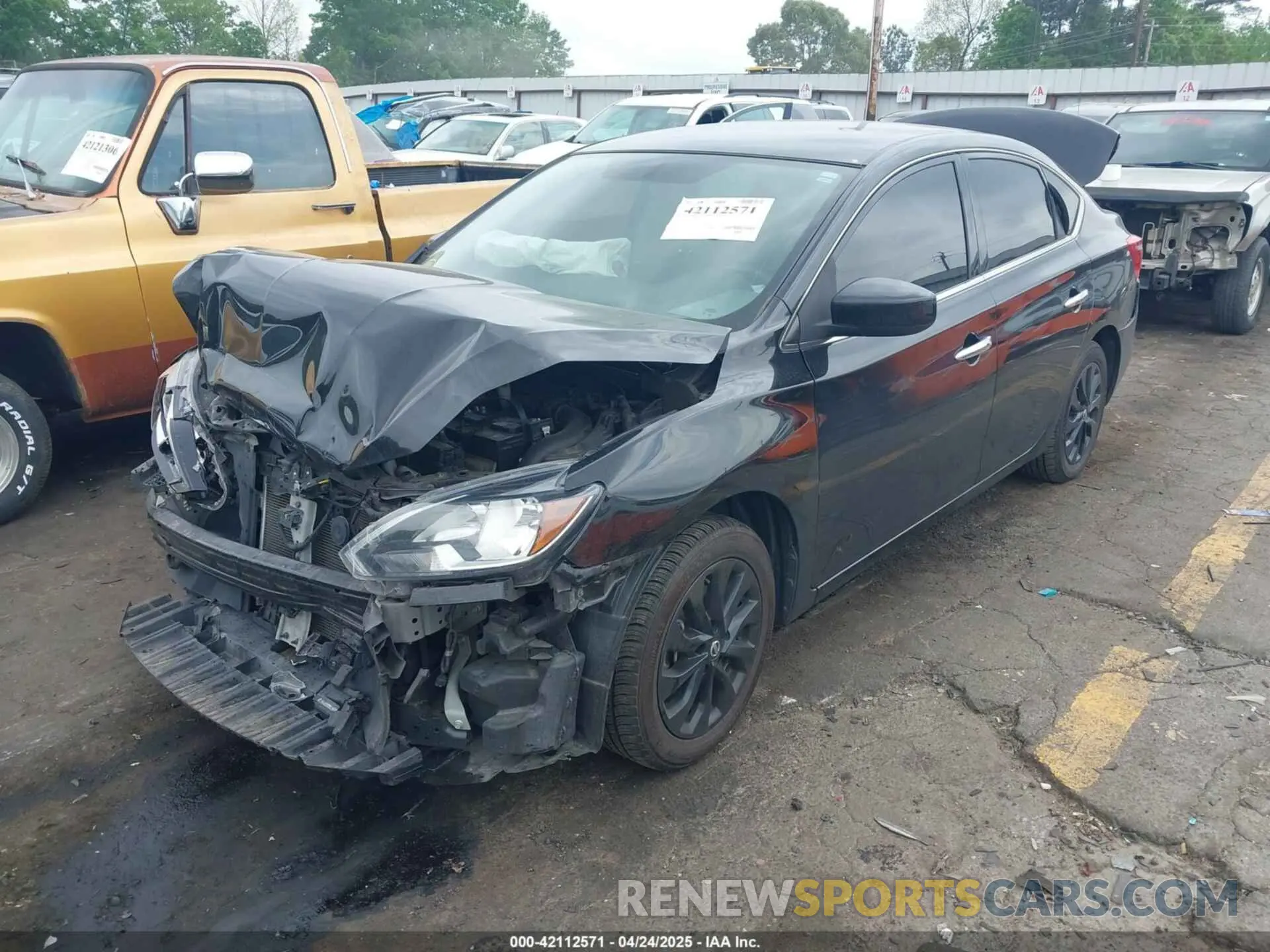 2 fotografías del automóvil dañado 3N1AB7AP1KY352664 NISSAN SENTRA 2019