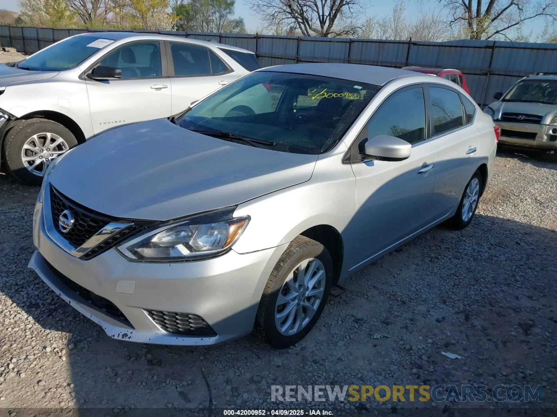 2 fotografías del automóvil dañado 3N1AB7AP2KY258096 NISSAN SENTRA 2019