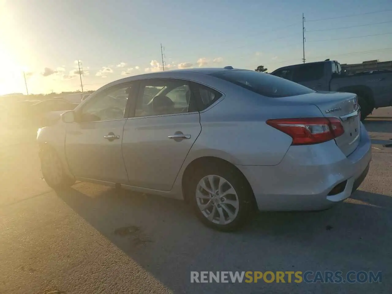 2 fotografías del automóvil dañado 3N1AB7AP3KY409382 NISSAN SENTRA 2019