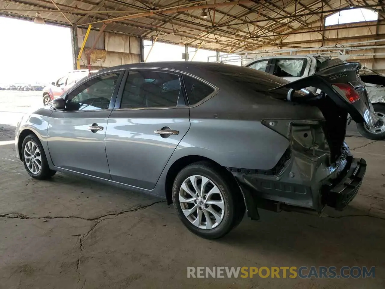 2 fotografías del automóvil dañado 3N1AB7AP5KY211998 NISSAN SENTRA 2019