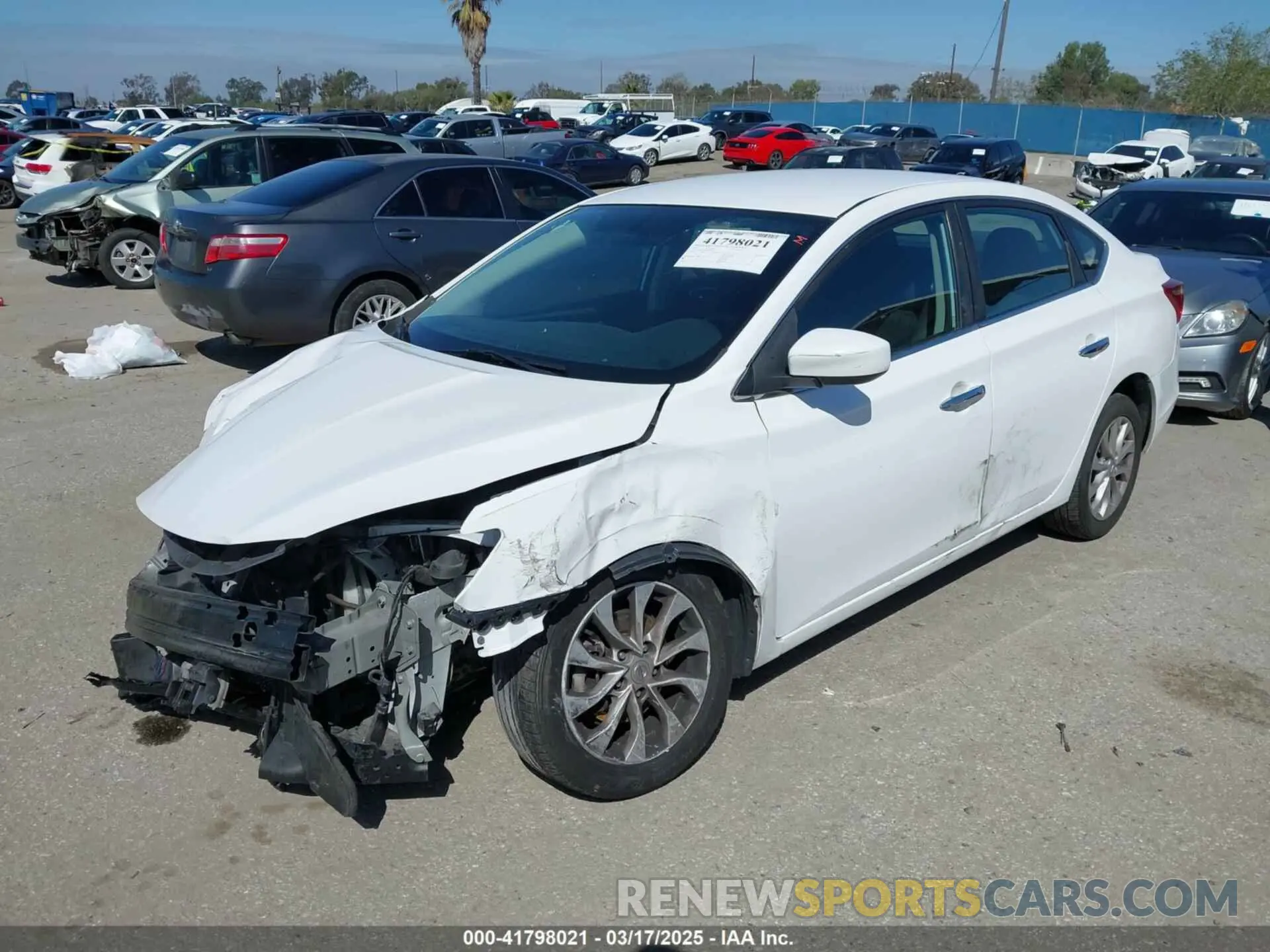 2 fotografías del automóvil dañado 3N1AB7AP5KY449382 NISSAN SENTRA 2019