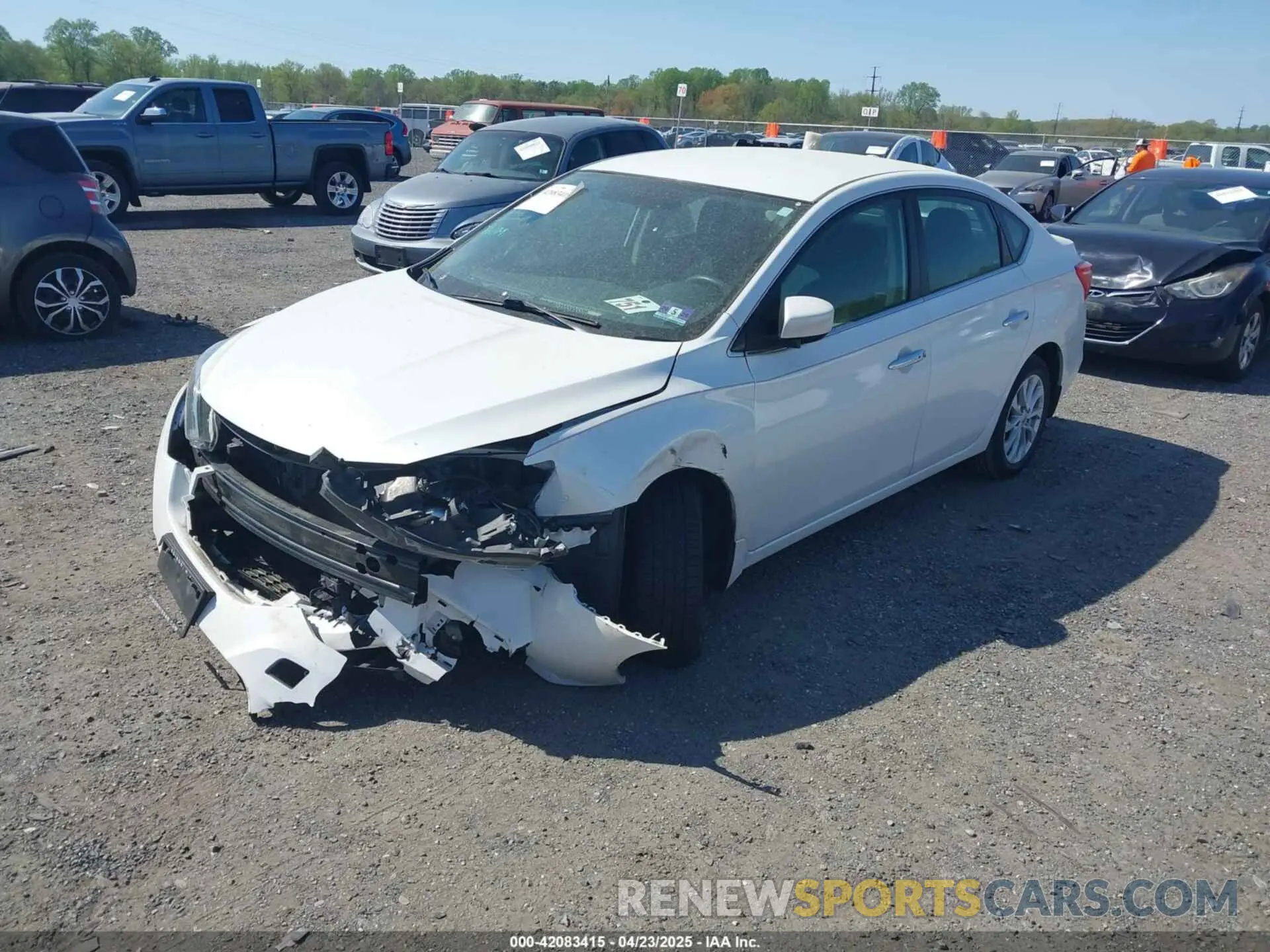 2 fotografías del automóvil dañado 3N1AB7AP6KY239955 NISSAN SENTRA 2019