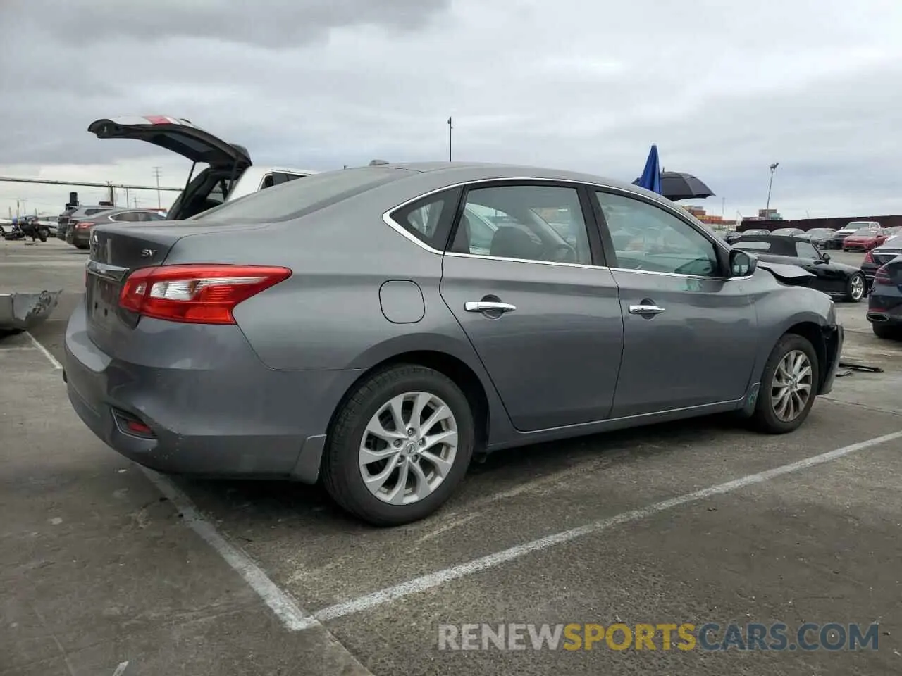 3 fotografías del automóvil dañado 3N1AB7AP7KY233842 NISSAN SENTRA 2019