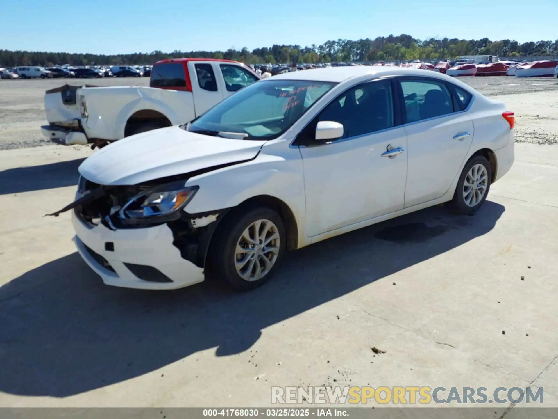2 fotografías del automóvil dañado 3N1AB7AP7KY438285 NISSAN SENTRA 2019