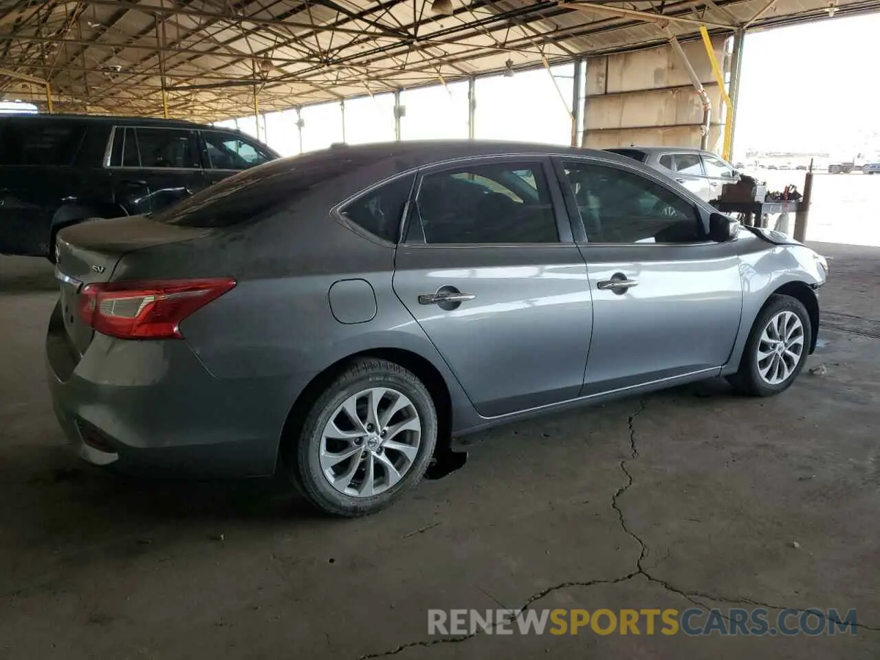 3 fotografías del automóvil dañado 3N1AB7AP7KY452784 NISSAN SENTRA 2019
