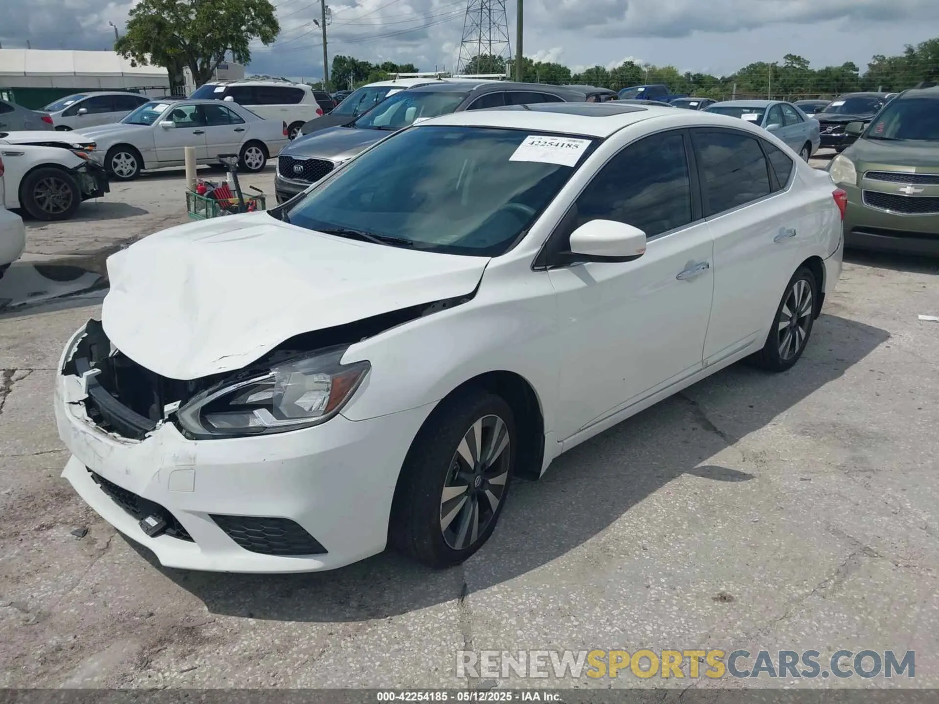 2 fotografías del automóvil dañado 3N1AB7AP8KY225975 NISSAN SENTRA 2019
